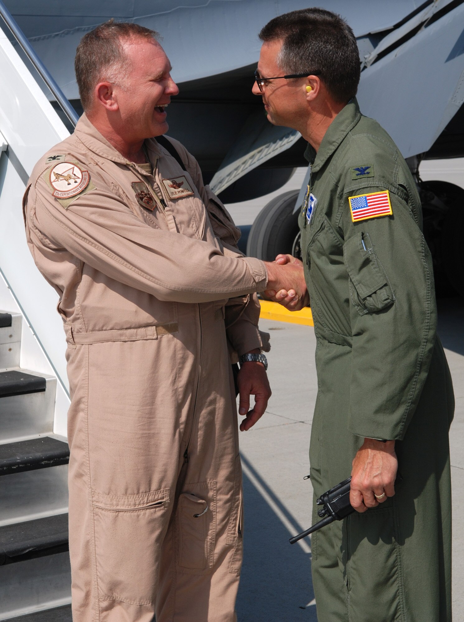 FAIRCHILD AIR FORCE BASE, Wash.—Col. Lyle Powell, 92 Air Refueling Wing special assistant to the commander is greeted by Col. Scott Hanson, 92 ARW commander as he arrives back at Fairchild. Colonel Powell is returning from a tour in Afghanistan in support of Operation Enduring Freedom. (U.S. Air Force photo / Tech. Sgt. Larry Carpenter)