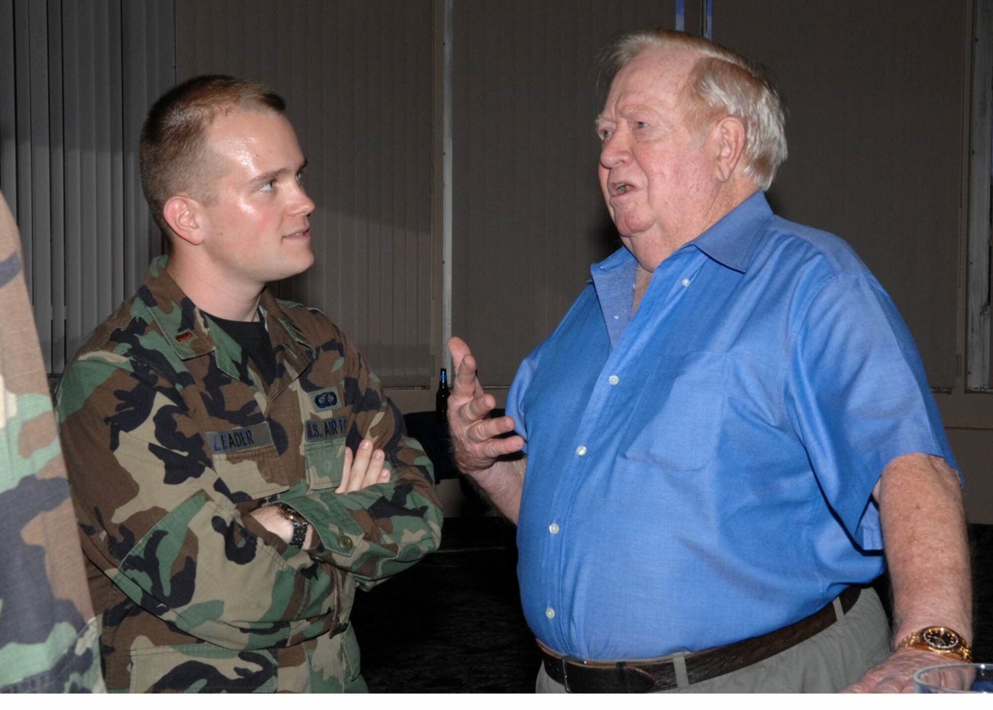 Retired Col. Joe Kittinger signs autographs and tells Airmen of his time in the Air Force. Colonel Kittinger was in projects such as Man High and Excelsior and holds the world record for completing a helium balloon jump from more than 100,000 feet. (U.S. Air Force photo by Airman 1st Class Rachel Kocin)