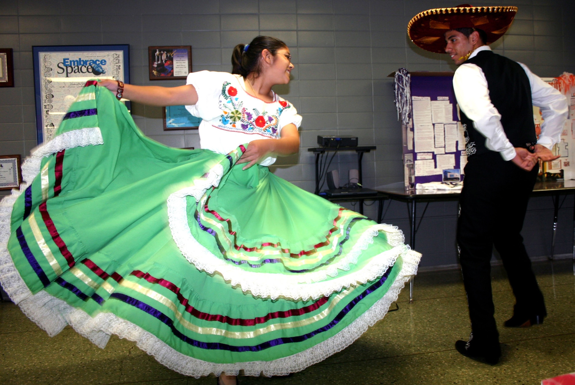 Zundy Junior High School students Reby Arriaga and Mauricio Delgado perform a Mexican folk dance to entertain attendees at the Student Achievement Initiative Appreciation ceremony May 10. (U.S. Air Force photo/Staff Sgt. Tonnette Thompson)