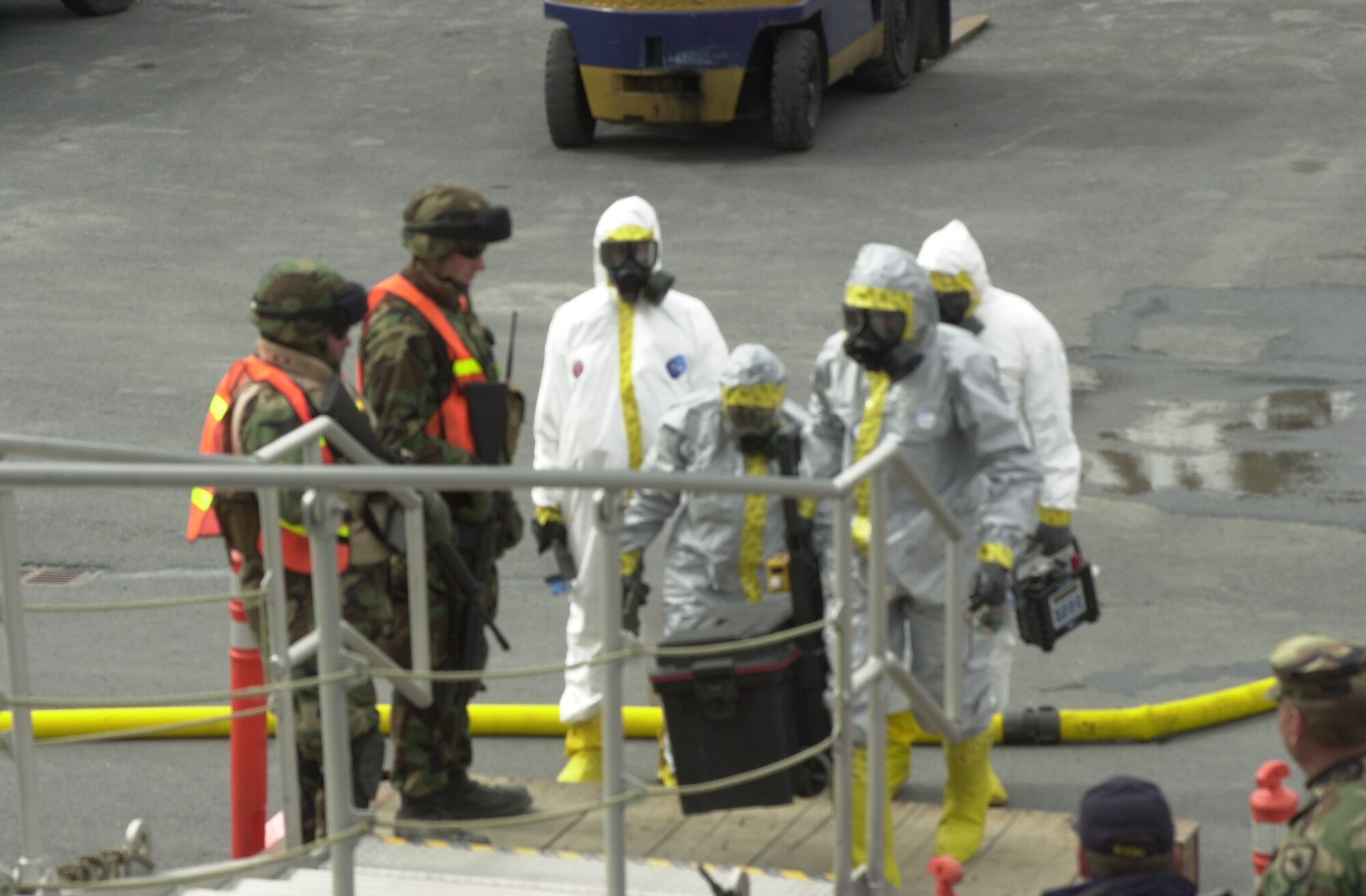 Seward, AK – Members of the National Guard Civil Support Team transport hazardous material detection and containment equipment aboard the USNS Kaiser (TAO-187) during the maritime portion of Alaska Shield/Northern Edge. Exercise Alaska Shield / Northern Edge 07 is a state of Alaska / US Northern Command sponsored homeland defense / defense support of civil authorities exercise; part of the national-level Ardent Sentry / Northern Edge 07 exercise.  Photo by Lieutenant Todd Spitler.