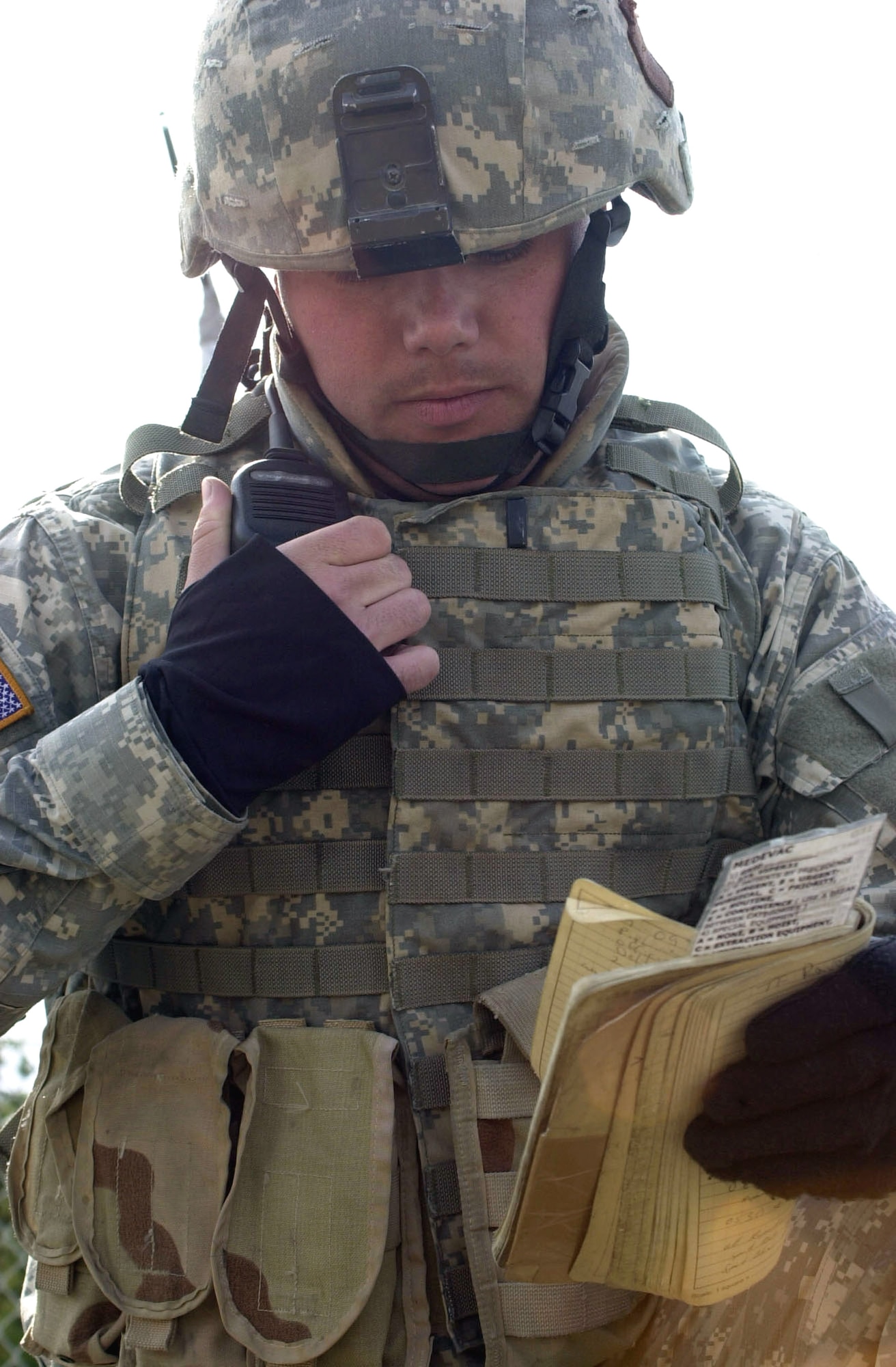 An Army National Guardsmen from Nebraska radios in for support after his unit detained a suspected terrorist during an Alaska Shield/Northern Edge 07 scenario May 9 at Fairbanks, Alaska. His radio is networked to the communications systems of other participating local, state, federal and private agencies due to an initiative called the Incident Command System. This cross-agency system improves coordinated response to emergencies such as natural disasters or terrorist attacks. (U.S. Air Force photo/Staff Sgt. J.G. Buzanowski)