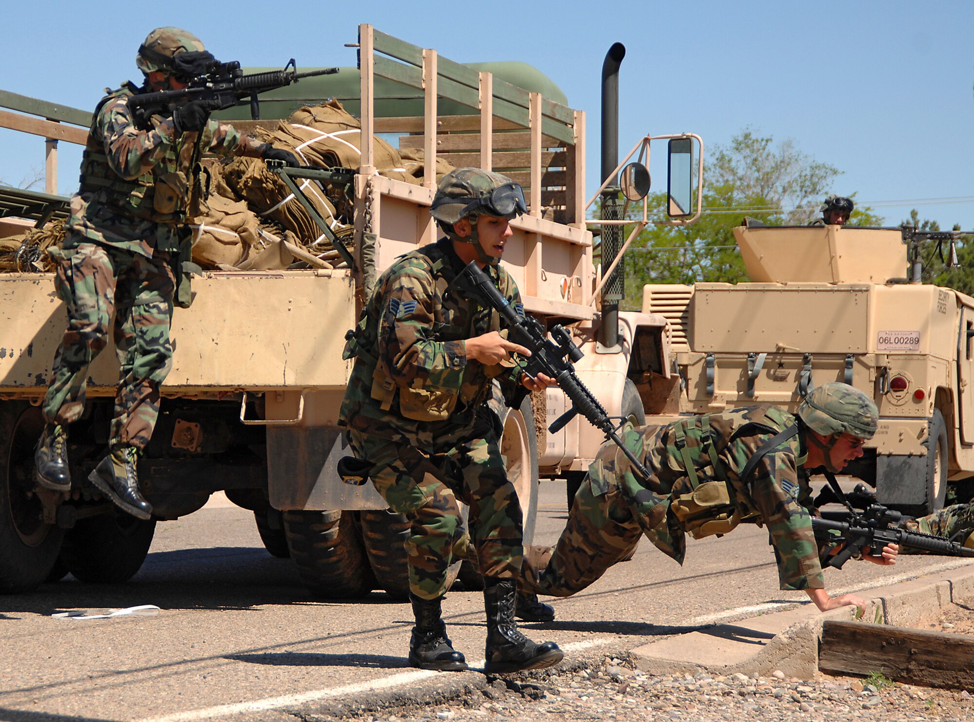 Members of the 377th Security Forces Squadron practice their convoy defense skills during a training exercise while assigned to the security forces? training flight here. U.S. Air Force photo by Adam Wooten