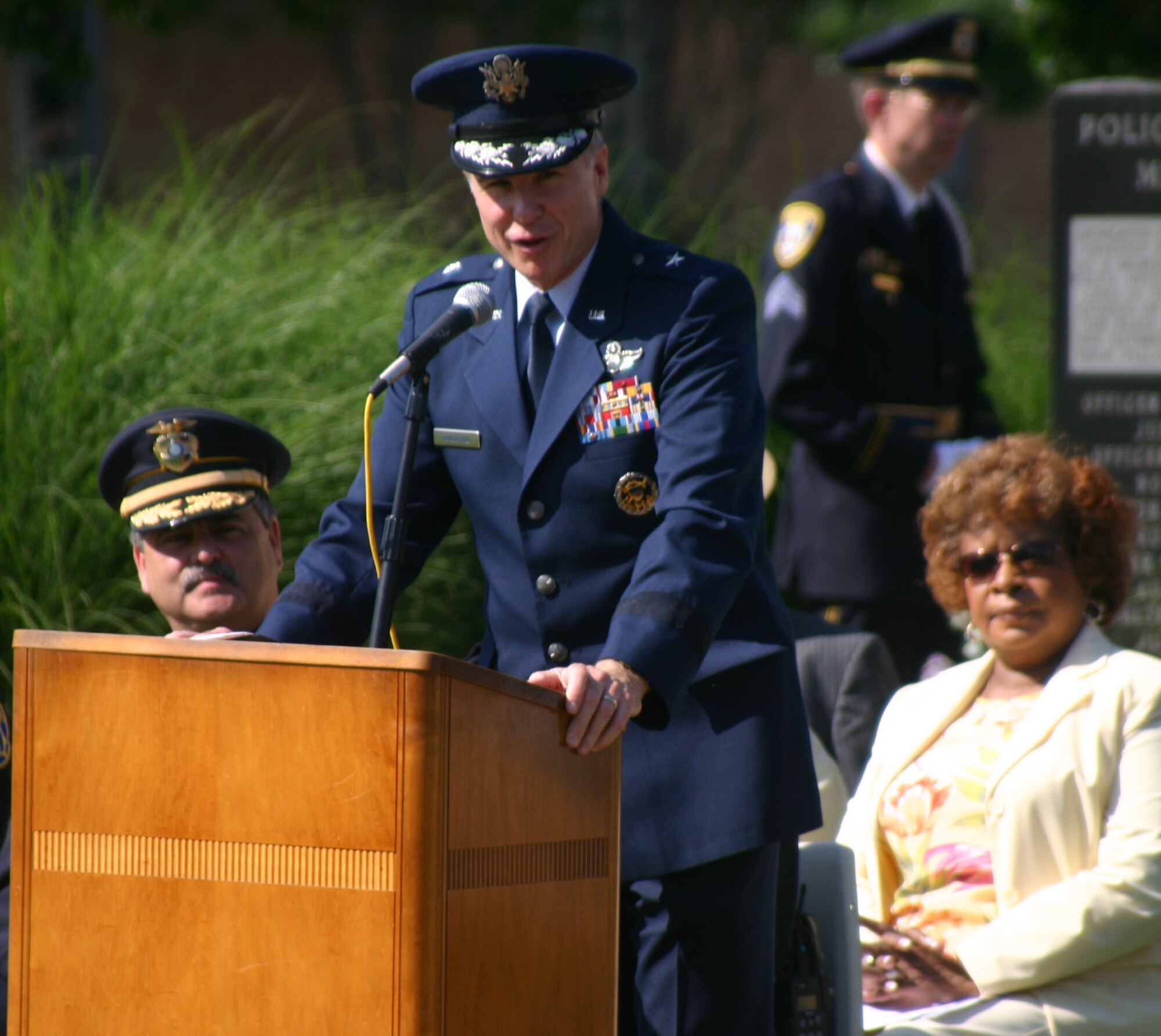 Sheppard Air Force Base security forces personnel and Wichita Falls policemen honored police officers May 14 who have been killed in the line of duty. Brig. Gen. Richard Devereaux, commander of the 82nd Training Wing, addresses the audience at a ceremony. The general explained the commonalities between those who are protecting the nation abroad, and those who don uniforms to protect communities. (U.S. Air Force photo/John Ingle) 