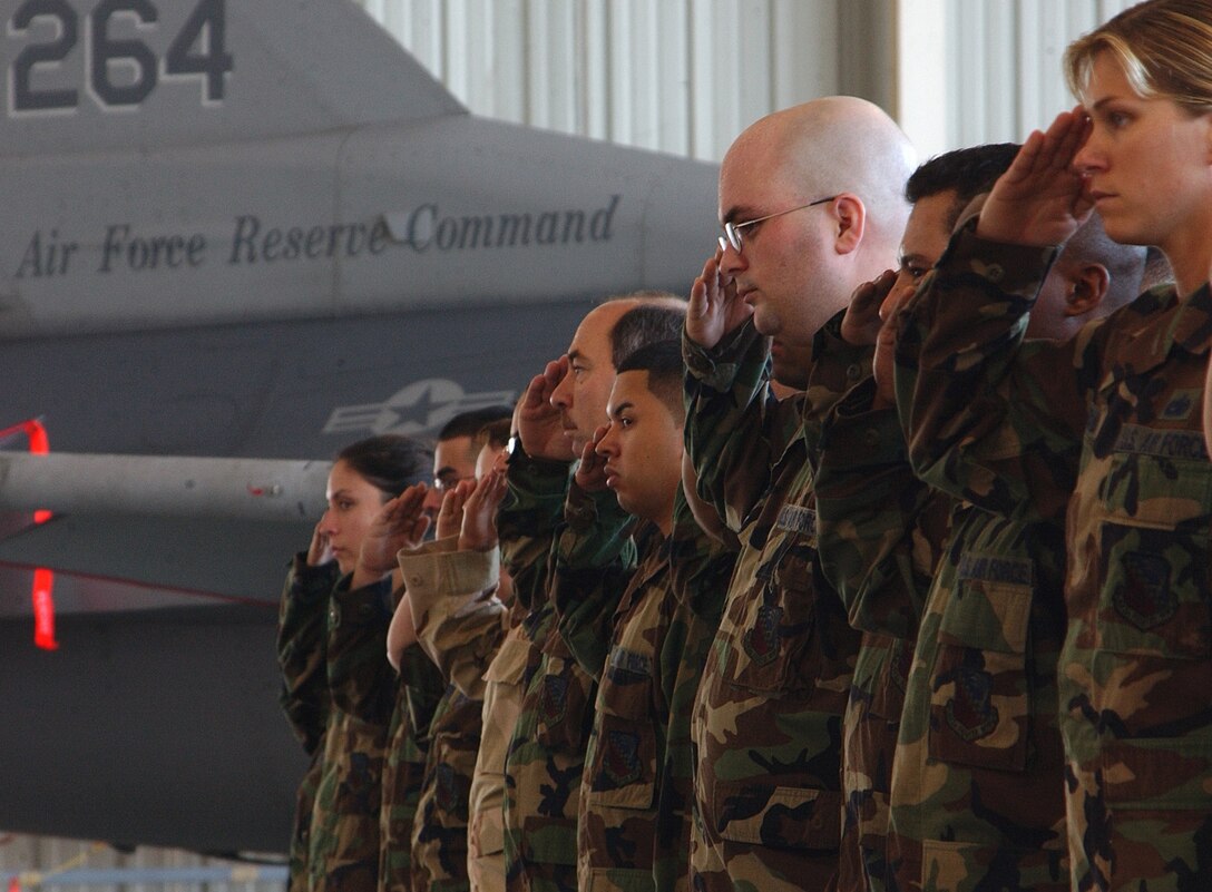 Airmen from the 482 Fighter Wing’s Maintenance Squadron salute in formation during a change of command ceremony at Homestead Air Reserve Base, Fla., May 6.  During the ceremony Maj. Luis M. Millares assumed command of the squadron.  The squadron consists of 252 personnel responsible for aerospace ground equipment, munitions, repair and calibration of equipment, off-equipment maintenance of aircraft and fabrication of parts.   The squadron provides direct support to the 93rd Fighter Squadron’s F-16 “Mako” fighter jets. (U.S. Air Force photo/Dan Galindo)