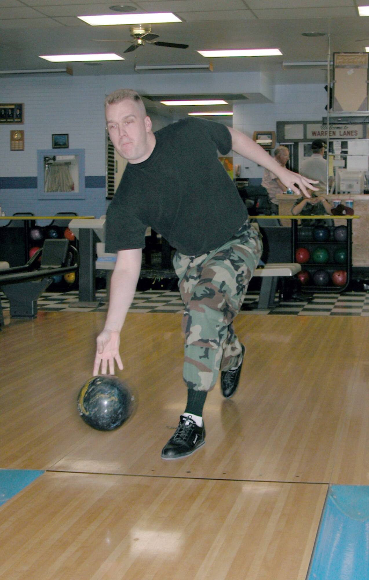 Tech. Sgt. David Thibodeau, 90th Medical Operations Squadron, bowls at Warren Lanes recently. Airmen earn rewards after bowling games this summer (Courtesy photo). 
