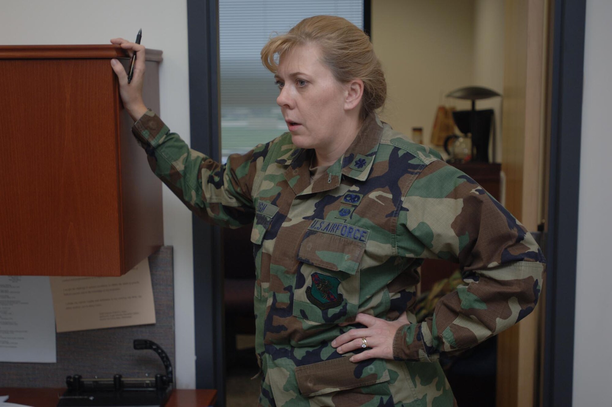 Lt. Col. DeAnn Lehigh listens to a fellow 931st officer at a meeting during the May Unit Training Assembly.  Colonel Lehigh was named the Air Force's Outstanding Reserve Judge Advocate of the Year.
