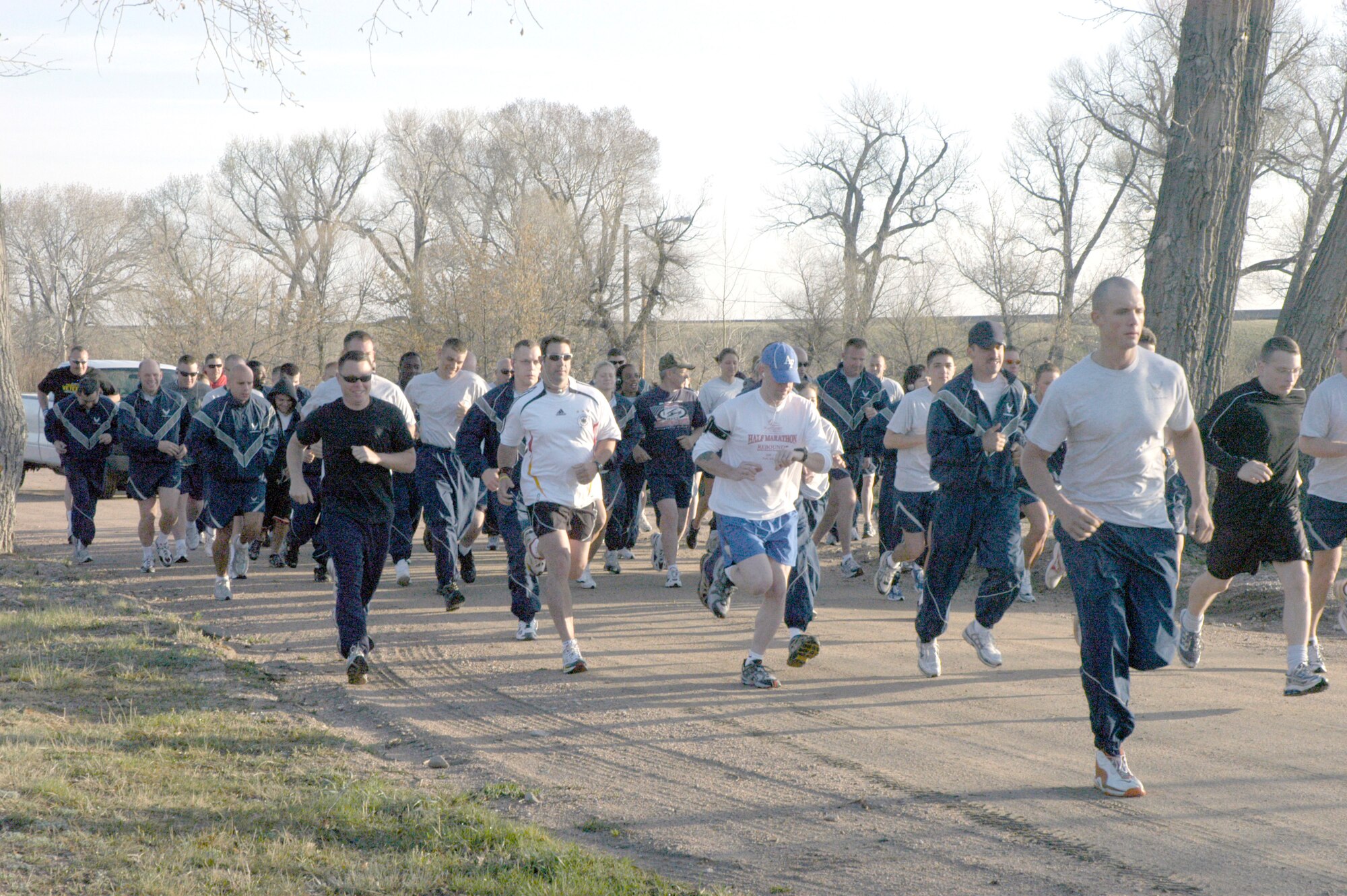 Warren Airmen begin a 3K race at the start of a car horn May 1 at FamCamp. The race kicked off Warren’s National Physical Fitness and Sports Month activities. The 90th Services Squadron is holding several physical fitness events to commemorate the month. The three top finishers of the race were Maj. Daniel Knight, 90th Mission Support Squadron commander, Matt Carrdloo and Master Sgt. Mark Nowotny, 37th Helicopter Squadron (Photo by Capt. Nora Eyle).