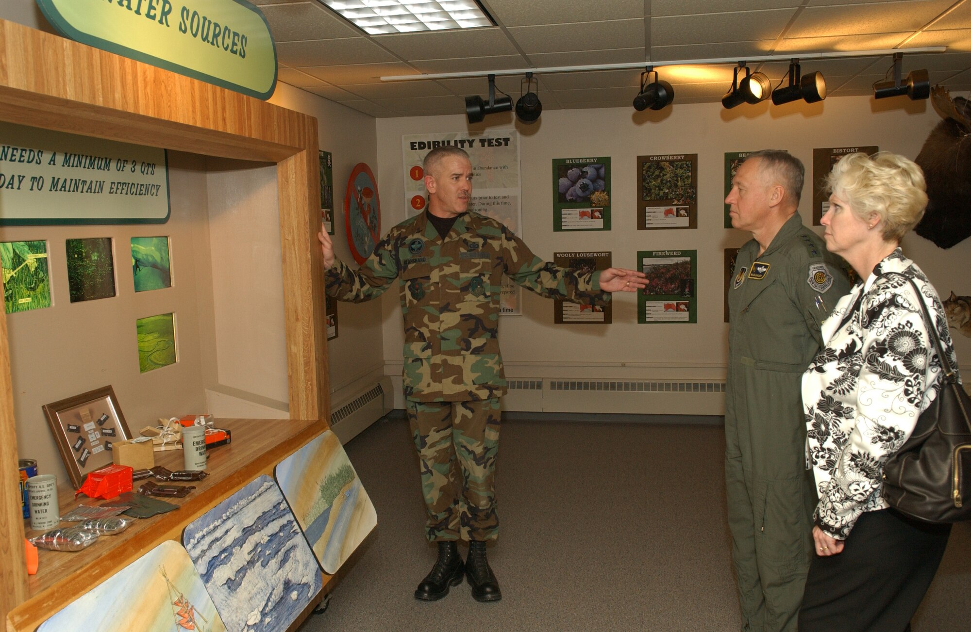 EIELSON AIR FORCE BASE, Alaska --Master Sgt. Robert Blanchard, DET 1/66th TRS gives General Bruce Carlson, Air Force Mobility Command commander, a tour of Arctic Survival School May 14. Pilots and aircrew members participate in the week-long arctic survival training.  (U.S. Air Force photo by Airman 1st Class Christopher Griffin)