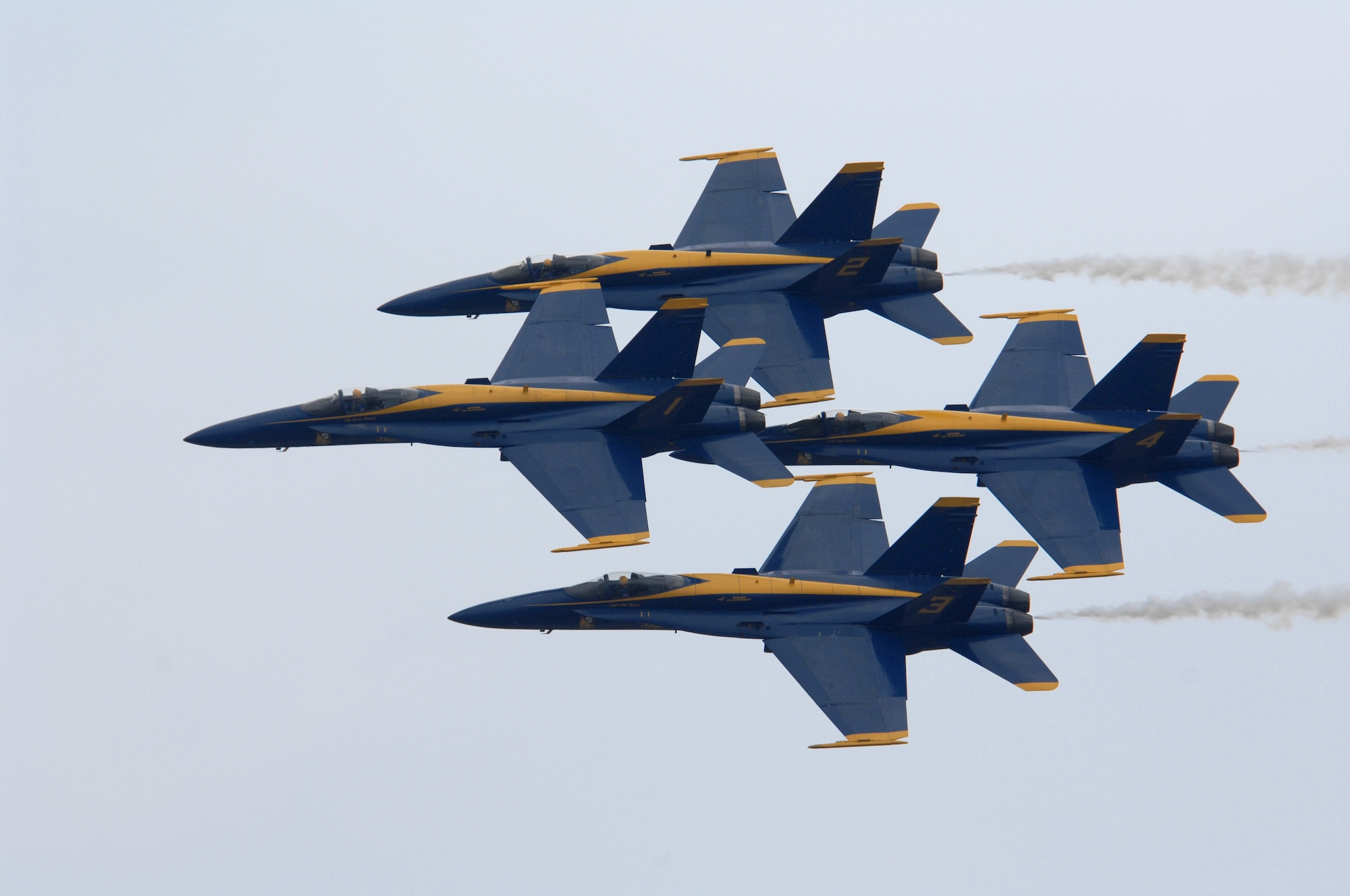 The U.S. Navy Blue Angels fly in a diamond formation at the Wings Over Wayne Airshow here May 12. The Wings Over Wayne Airshow 2007 is the first apperance of the Blue Angels since the accident that occurred April 21.(U.S. Air Force photo by Airman 1st Class Greg Biondo)(released)