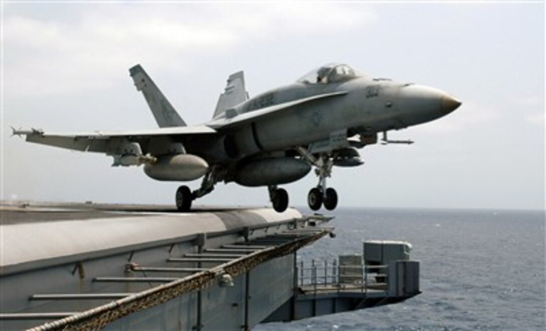 An F/A-18A Hornet assigned to the "Red Devils" of Marine Fighter Attack Squadron 232 launches from the flight deck of the nuclear-powered aircraft carrier USS Nimitz  in the Indian Ocean, May 11, 2007. The Nimitz Carrier Strike Group and embarked Carrier Air Wing 11 are deployed in the U.S. 5th Fleet, conducting maritime security operations and supporting troops participating in Operation Enduring Freedom. 