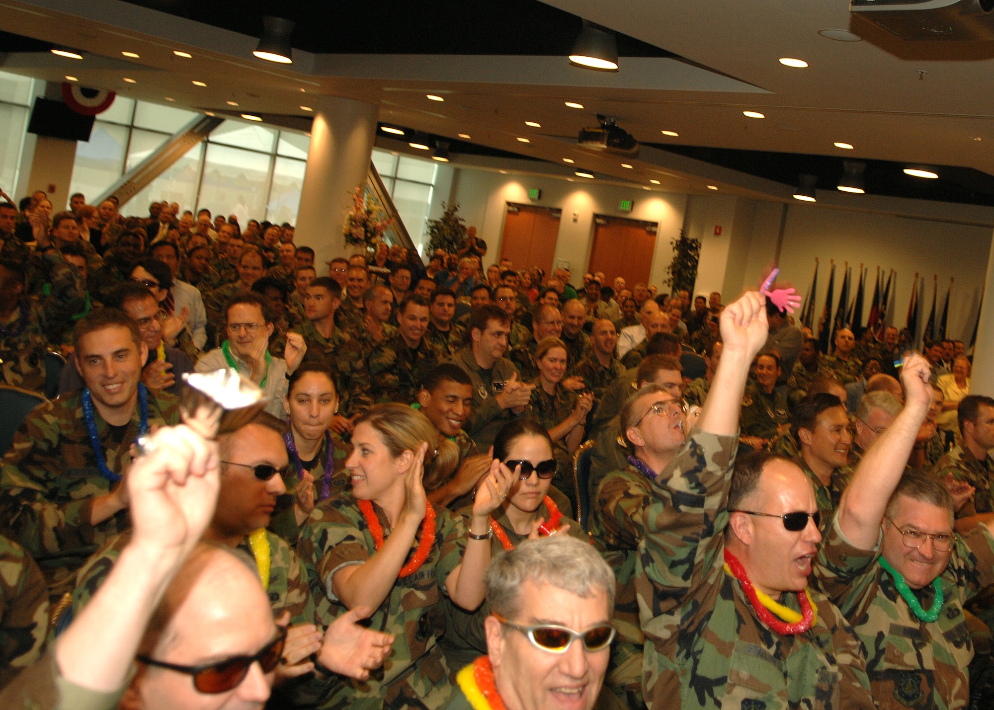 Personnel from the Military Satellite Communications Systems Wing get rowdy at the Los Angeles Air Force Base ORI out brief on May 15. The wing was one of four wings and groups to be inspected under the compliance portion of the ORI.