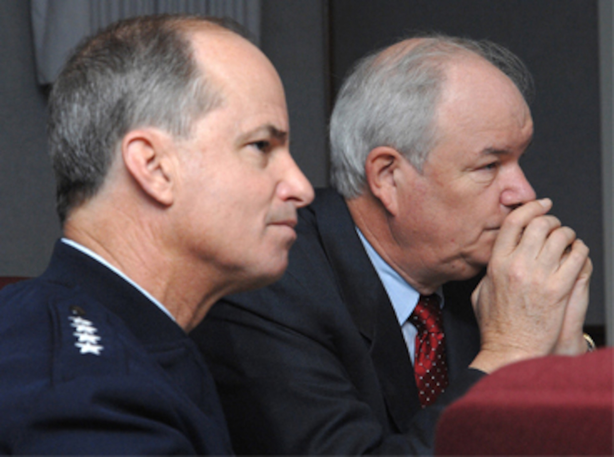Secretary of the Air Force Michael W. Wynne and Gen. Kevin P. Chilton listen to a briefing May 7 at Peterson Air Force Base, Colo., on several focus areas of Air Force Space Command, including space professional development and the National Space Security Institute. General Chilton is the AFSPC commander. (U.S. Air Force photo/Tech. Sgt. Raheem Moore)