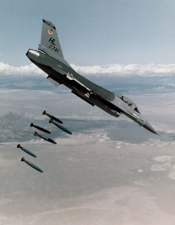 General Dynamics F-16A-15 (S/N 81-0741) of the 388 TFW, Hill Air Force Base, Utah, in flight dropping bombs. (U.S. Air Force photo)