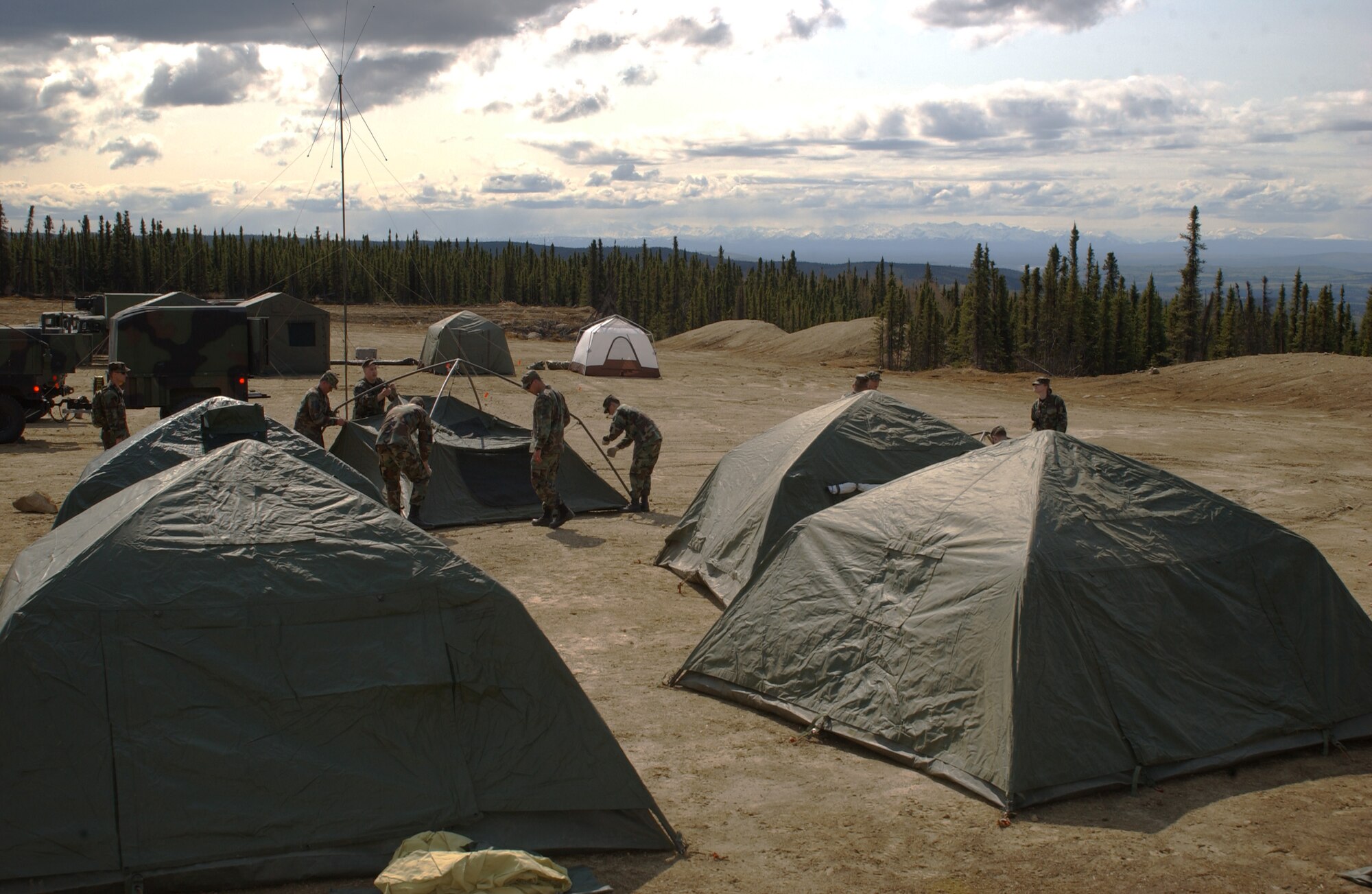 EIELSON AIR FORCE BASE, Alaska -- Airman of the 3rd Air Support Operations Squadron, setup base camp in the Yukon training area on May 15 during Operation URSA Minor. During the field training exercise, Airman will receive hands on training Combat Techniques, Self Aid Buddy Care and force protection. (U.S. Air Force Photo by Airman 1st Class Jonathan Snyder) 
