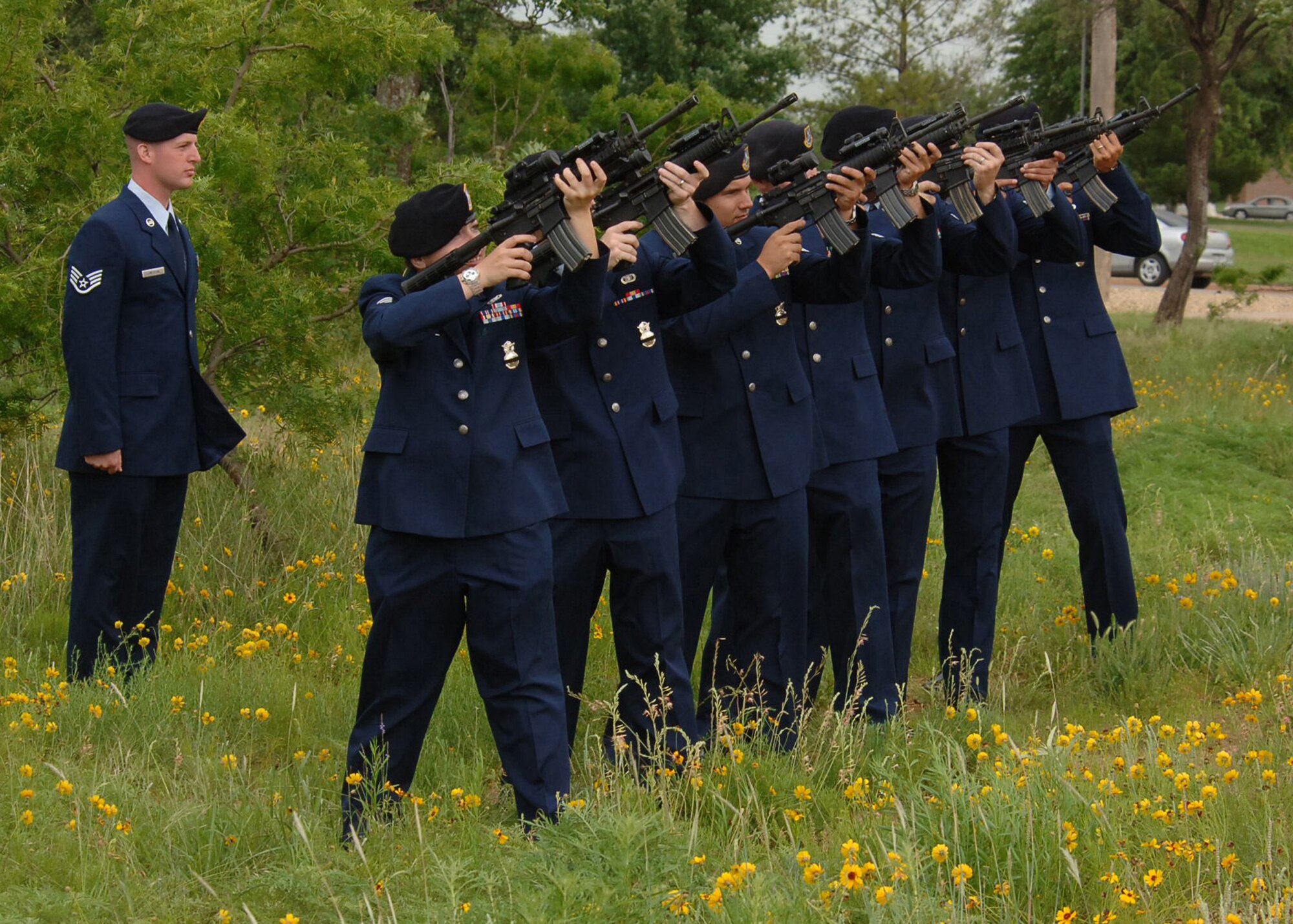 DYESS AIR FORCE BASE, Texas --  Members of the 7th Security Forces Squadron take part in a 21-gun salute during retreat May 15 in honor of National Peace Officers Memorial Day. (U.S. Air Force photo/Airman 1st Class Felicia Juenke)