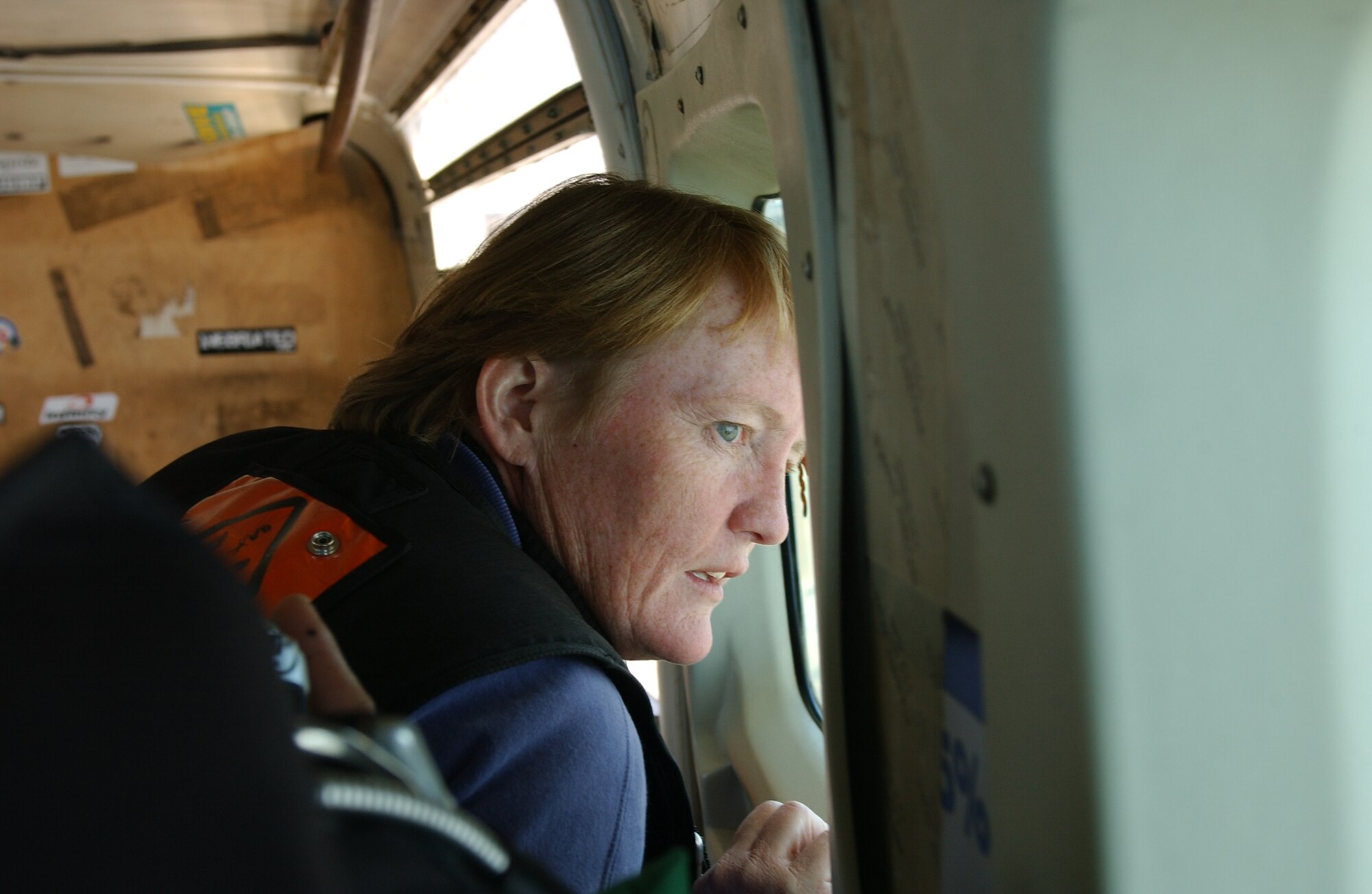 Moments before her jump, Donna Rathbun, Vandenberg’s Sexual Assault Response Coordinator, sees the city of Lompoc two miles below during “Operation Free-Fall” April 20.  Thousands of people jump during the annual nation-wide event held during Sexual Assault Awareness Month in April, to empower survivors and to raise awareness to what has become the nation’s most under reported crime.  (U.S. Air Force photo by Airman 1st Class Adam Guy)