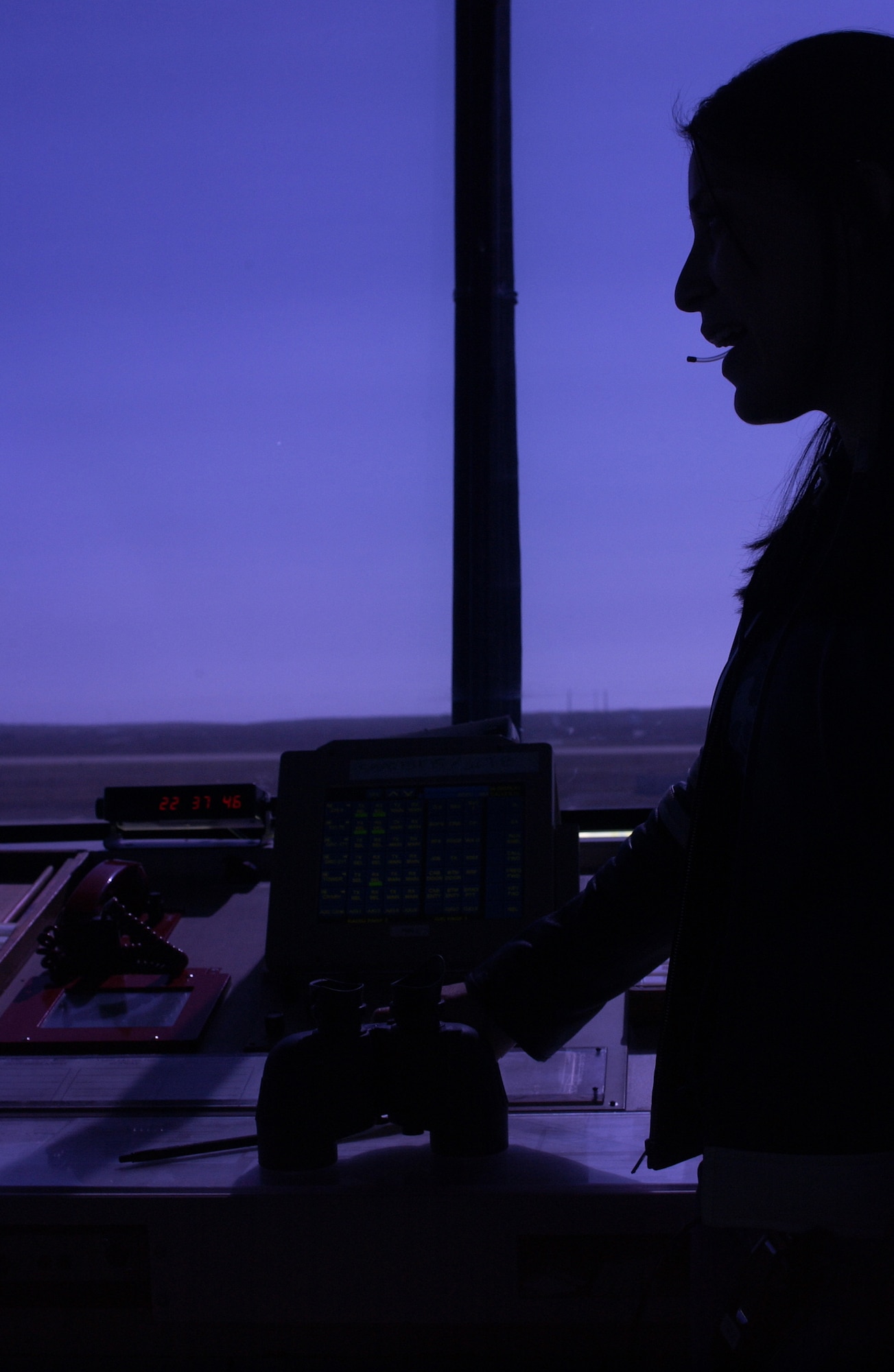 Vandenberg's airspace is managed by contracted air traffic controllers like Jessica Mayer, 30th Operation Support Squadron, who corresponds with approaching aircraft at Vandenberg Air Force Base, March 27.    (U.S. Air Force photo by Airman 1st Class Trey Lewis)