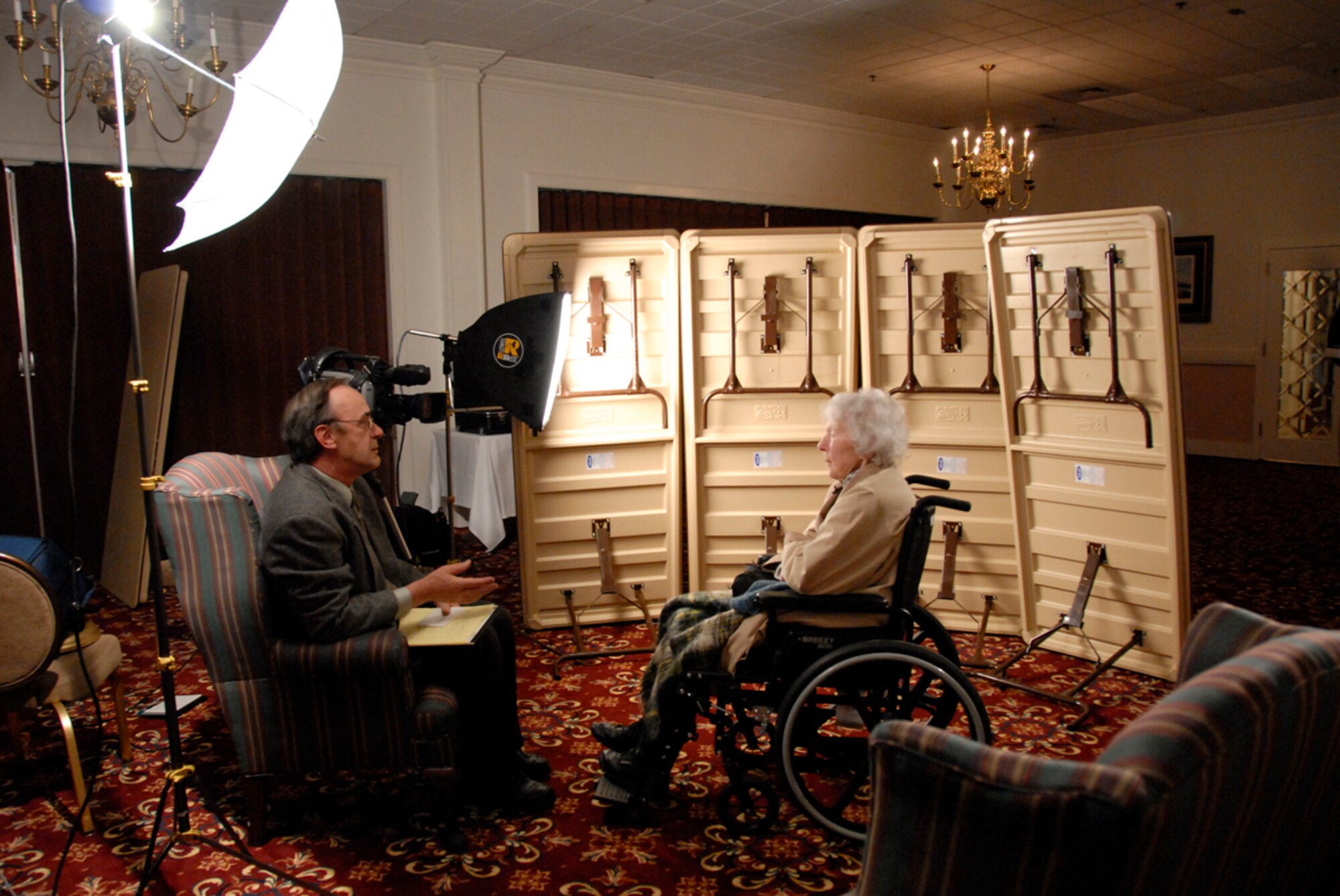 J.C. Corcoran, 66th Air Base Wing Public Affairs, interviews retired Chief Master Sergeant Esther MacKay as part of the Living History Project, a documentary highlighting the lives of those who have significantly contributed to Air Force heritage. Chief MacKay, 101, is the oldest living Air Force chief master sergeant. (US Air Force Photo by 1st Lt. Martha Petersante-Gioia)