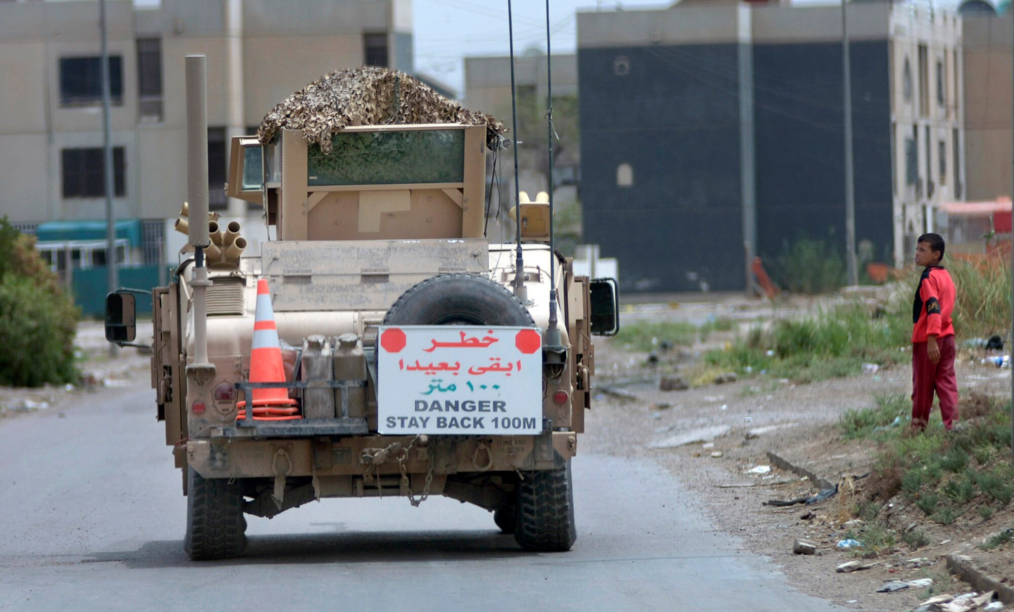 Det. 3, 732nd Expeditionary Security Forces Squadron members travel in up-armored vehicle convoys through the streets of Baghdad to perform police transition team missions of mentoring the Iraqi police May 9. (U.S. Air Force photo/Tech. Sgt. Cecilio M. Ricardo Jr.) 