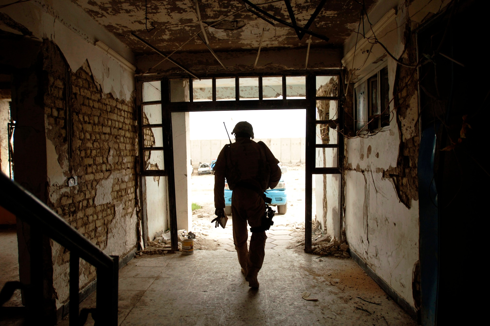 Staff Sgt. Michael Ellis and his convoy leave the recently bombed Baghdad police station after providing training to Iraqi police May 9 in Baghdad. Members of Det. 3, 732nd Expeditionary Security Forces Squadron, perform police transition team duties of mentoring, coaching and teaching. (U.S. Air Force photo/Tech. Sgt. Cecilio M. Ricardo Jr.) 
