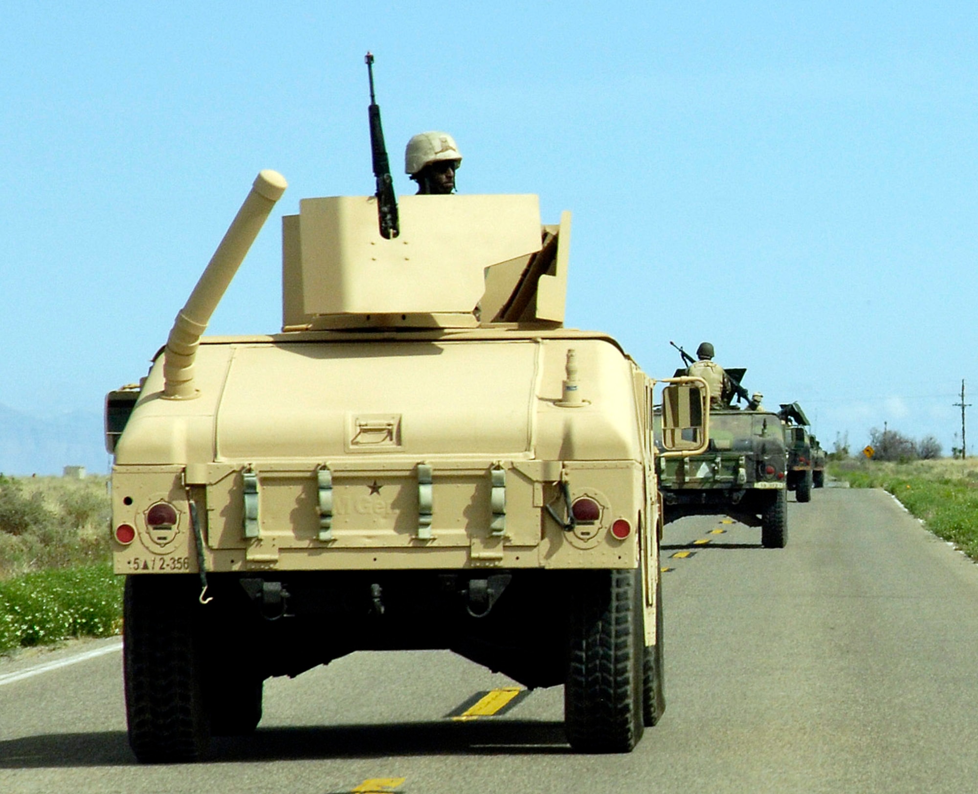 Airmen from the 49th Civil Engineer Squadron leave on a convoy as part of a deployment exercise at Holloman Air Force Base, N.M., May 7. The civil engineers trained with Soldiers from Fort Bliss, Texas, to incorporate the total force scenario experience. (U.S. Air Force photo/Airman 1st Class Michael Means) 