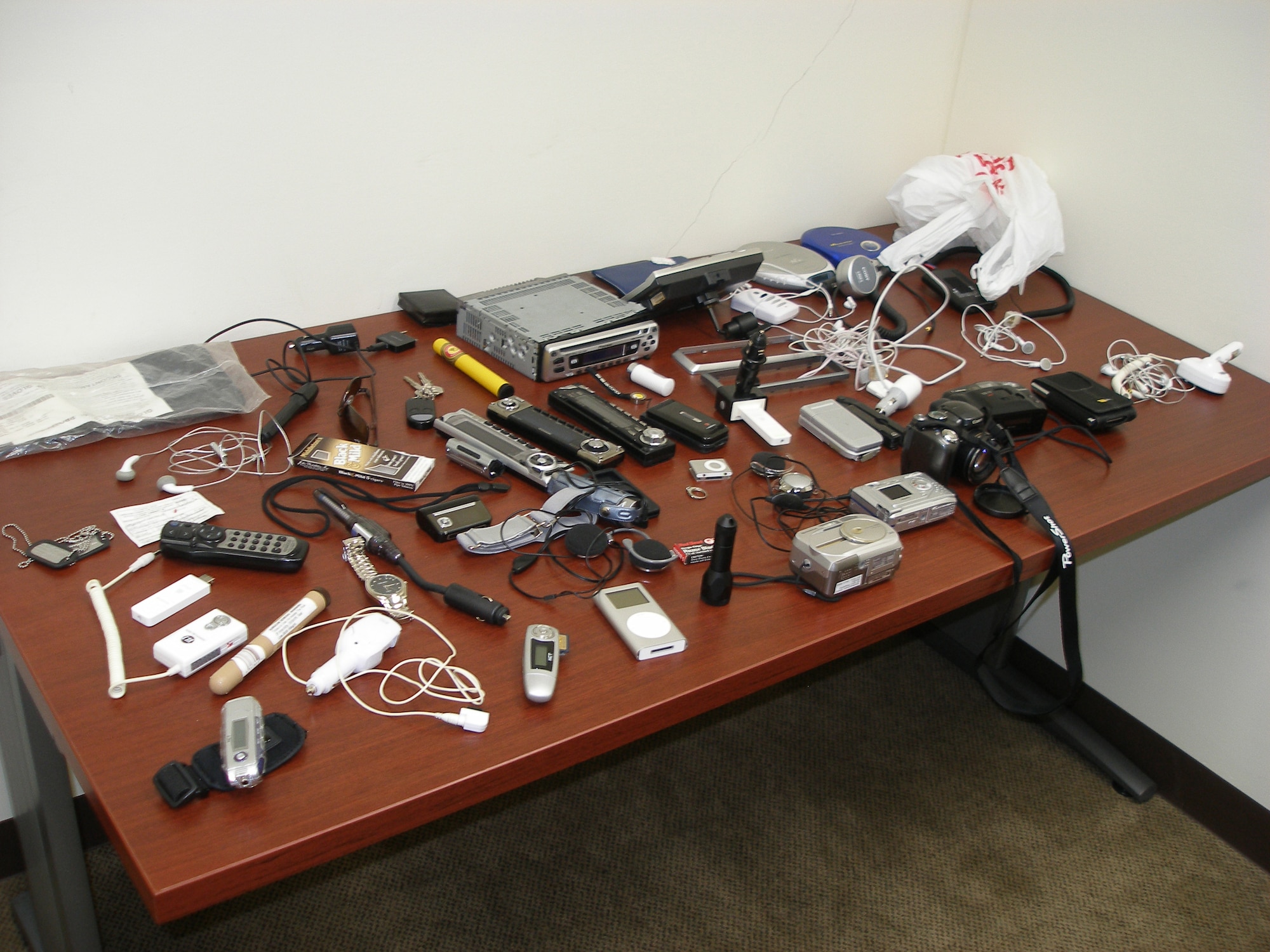 Kadena Security Forces recovered some of the dozens of items stolen by six dependents on Kadena Air Base, Japan. Three of them were barred from Kadena for 10 years. The other three were given hundreds of hours of community service and other punishments for their involvement in a series of criminal acts.
(U.S. Air Force photo)