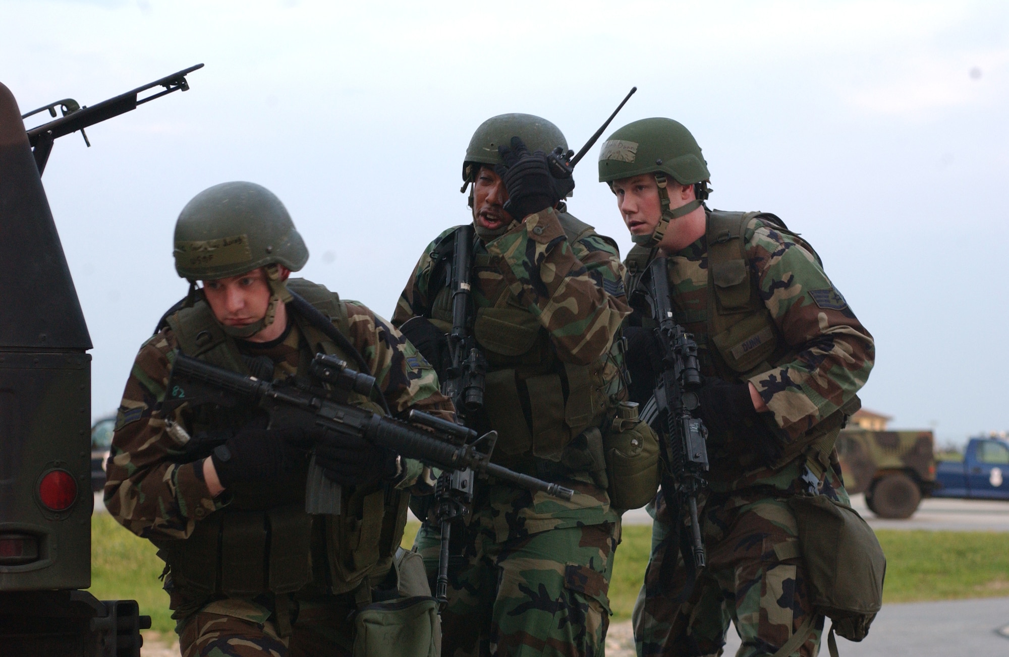 Airman 1st Class Jacob Goodwin (left), Staff Sgt. Nicholas Hutchinson (center) and Staff Sgt. Russell Dunn (right) respond during an Augmentation Force Exercise at Incirlik Air Base, Turkey April 12. (Photo by Airman 1st Class Tim Taylor). 