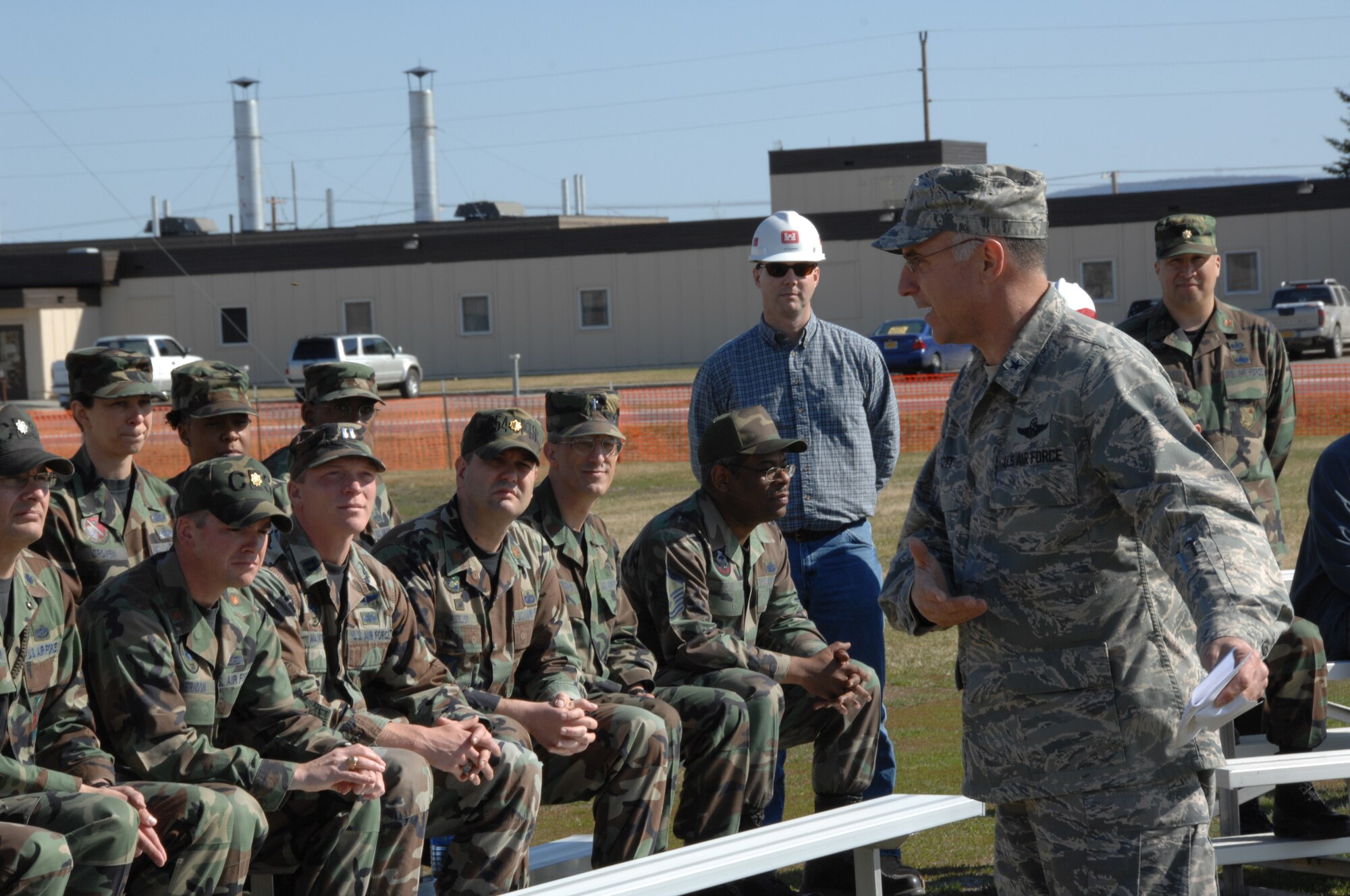 EIELSON AIR FORCE BASE, Alaska -- 354th Fighter Wing Commander, Brig. Gen. David Scott speaks during the ground breaking ceremony, 354th Services Squadrons Baker Field House May 18 at the future location of the $24 million, 60,000 sq. ft. facility. The addition includes an indoor playing field allowing for intramural play of flag football and soccer, a 1/8 mile running track enabling year-round Air Force Fitness Management testing, and a weight-room. The facility addition will enhance opportunities to maintain and improve fitness training levels as well as accommodate recreational demands often hampered by Interior Alaskan winters extreme elements. The addition is scheduled to be complete by July 2008.  (U.S. Air Force photo by Staff Sgt. Tia Schroeder)