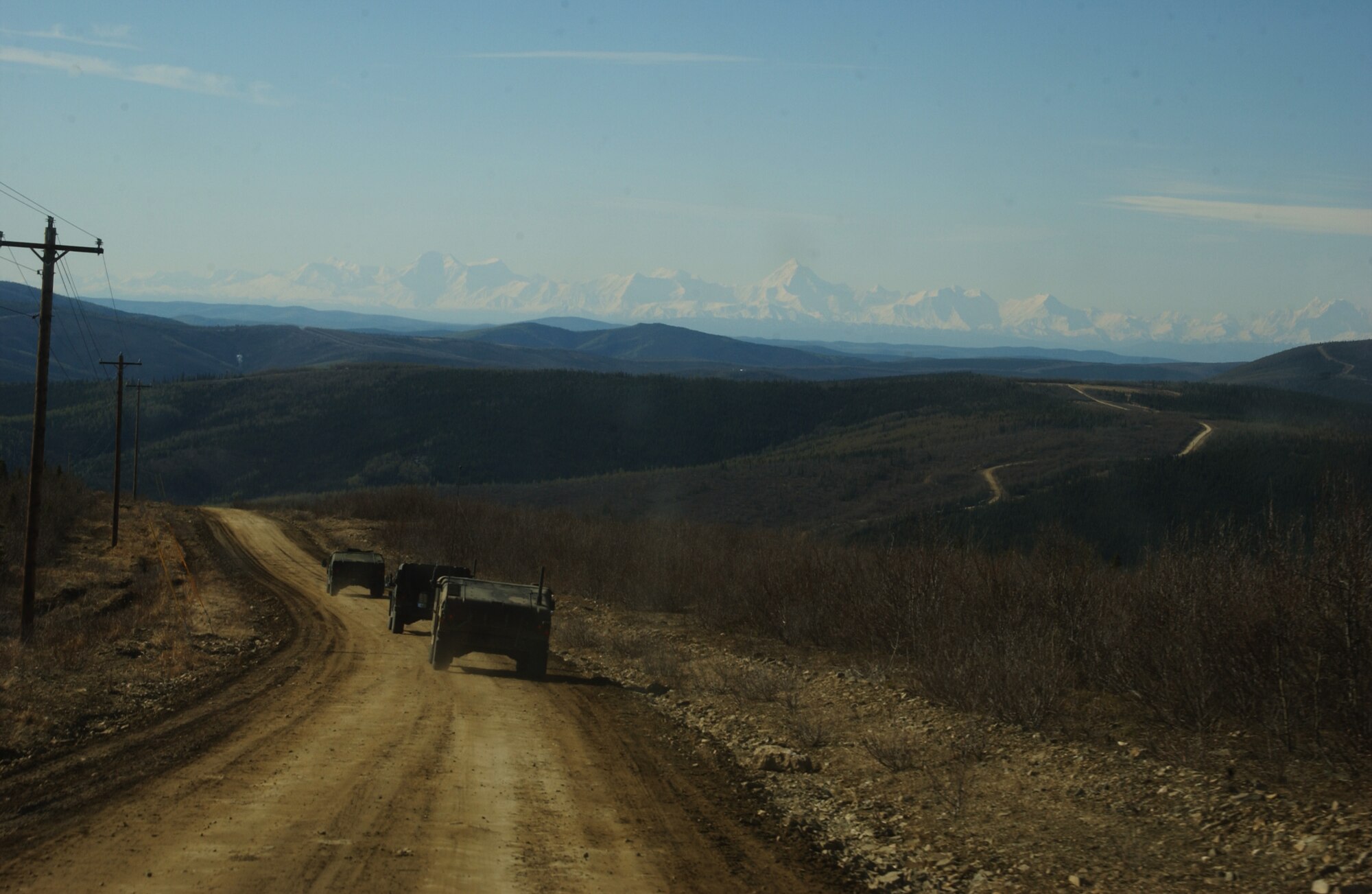 EIELSON AIR FORCE BASE, Alaska -- Airmen of the 3rd Air Support Operations Squadron must use their navigational skills to transport an air liaison officer to checkpoint two avoiding possible improvised explosive devices along the way during day three of Operation URSA Minor May 17. The 3rd ASOS, equips, and maintains mission-ready air liaison, terminal attack control, and weather observation/forecasting elements to support the U.S. Army Alaska 1st Stryker Brigade Combat Team. (U.S. Air Force Photo by Airman 1st Class Jonathan Snyder) 