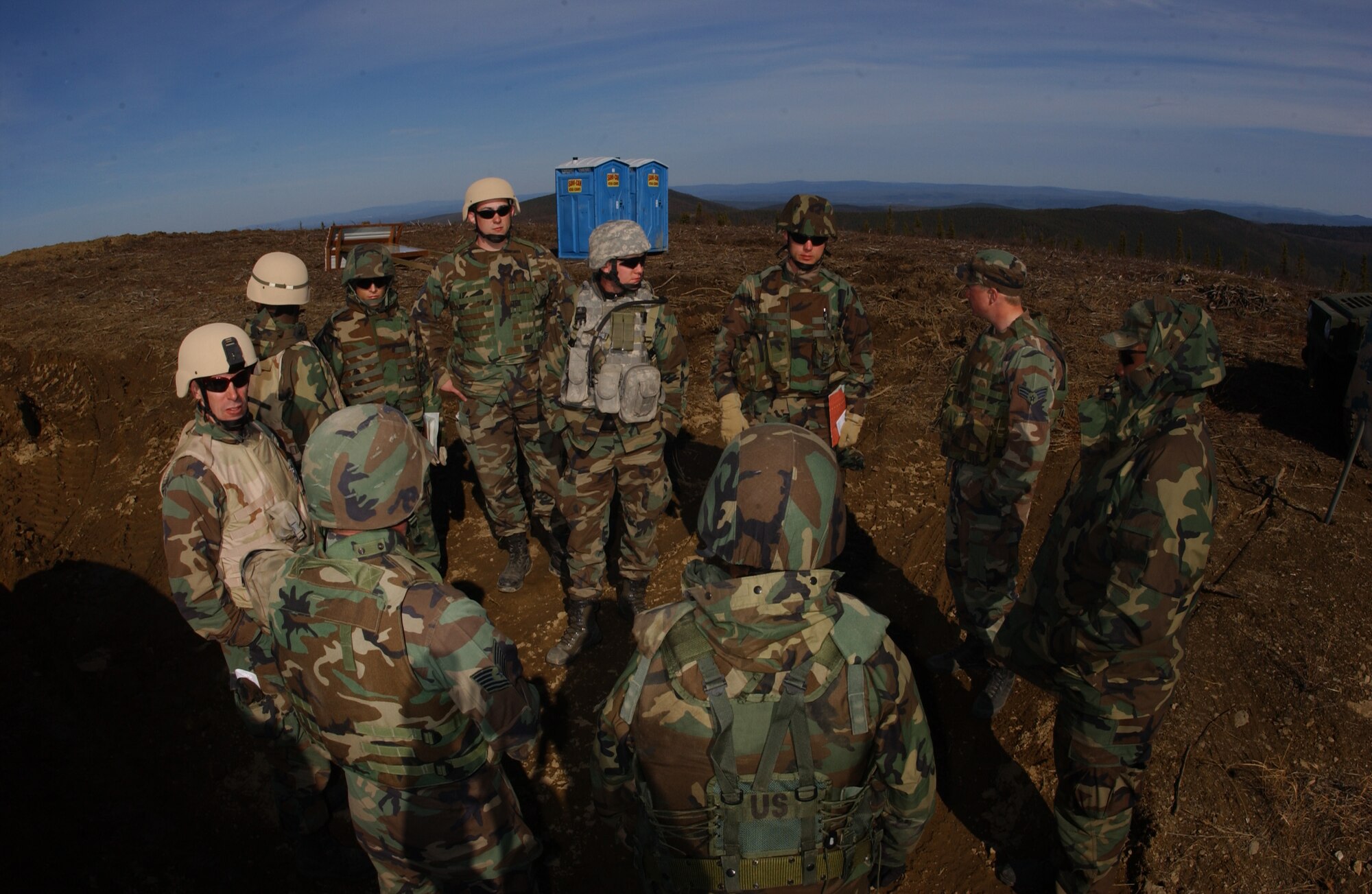 EIELSON AIR FORCE BASE, Alaska -- Airmen of the 3rd Air Support Operations Squadron, arrive at checkpoint two accomplishing their mission objective during Operation URSA Minor May 17. The last scenario of the exercise 3rd ASOS Airmen must their navigational skills to transport an air liaison officer to checkpoint two avoiding possible improvised explosive devices along the way. (U.S. Air Force Photo by Airman 1st Class Jonathan Snyder)