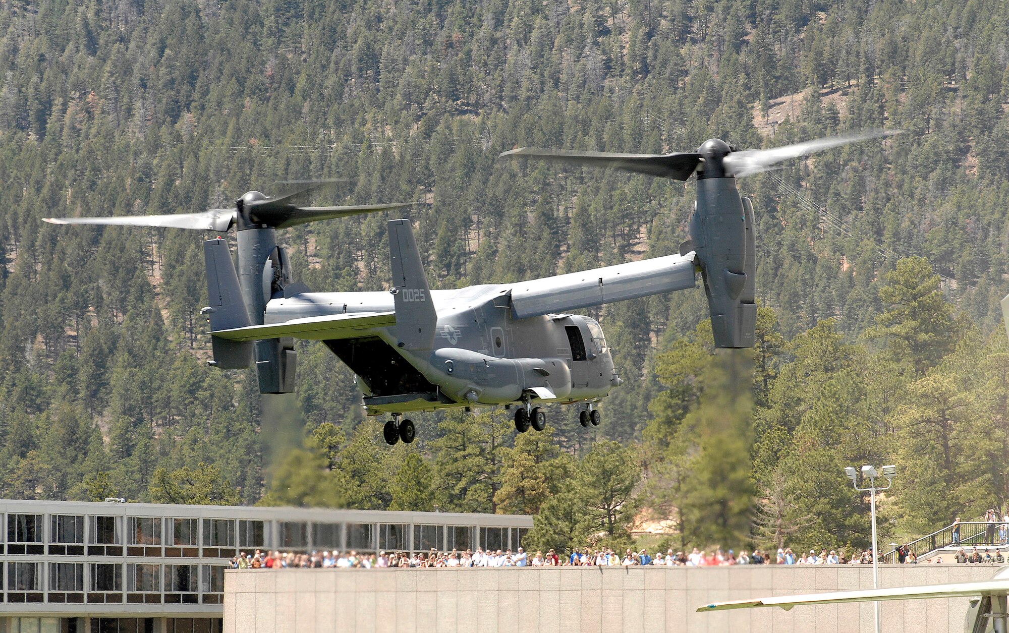 A CV-22 Osprey prepares to land at the U.S. Air Force Academy May 11.  Cadets in the Department of Aeronautical Engineering's High-Performance Computing Research Center contributed to making this aircraft an operational reality through their research in computational fluid dynamics.  (U.S. Air Force photo/ Dennis Rogers)