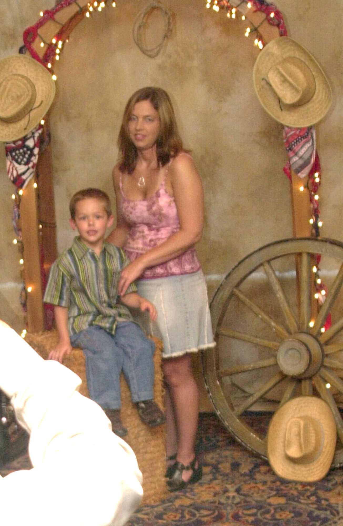 Holly VanCamp and her 5-year-old son Blaise try to capture the memory of the evening by posing for a couples’ photo. (U.S. Air Force photo by Airman 1st Class Luis Loza Gutierrez)