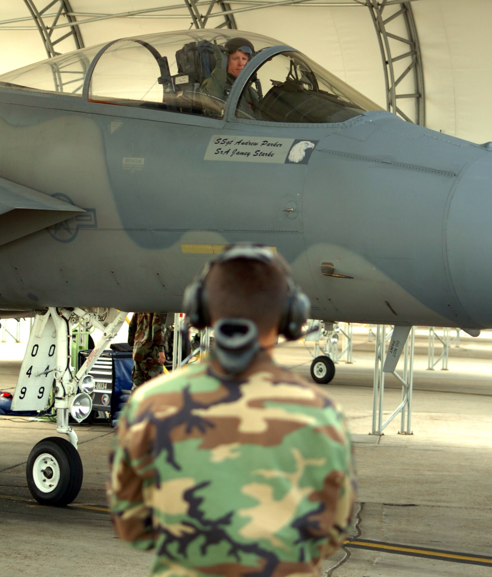 Col. Keith Feaga, 33d Fighter Wing Vice Commander, celebrates the end of his career May 17 in one of the first F-15Cs he flew as a second lieutenant stationed at Bitburg Air Base, Germany, in 1985. Aircraft tail number 9049 had already been in service for six years before then-2nd Lt. Keith Feaga flew the jet. "It's a real testament to the longevity of this airframe when a pilot with more than 29 years of experience can begin and end his career in the same jet," Colonel Feaga said. The F-15C has been in service for nearly 30 years and will continue to be a part of the Air Force's inventory of legacy aircraft for the next 20 years.