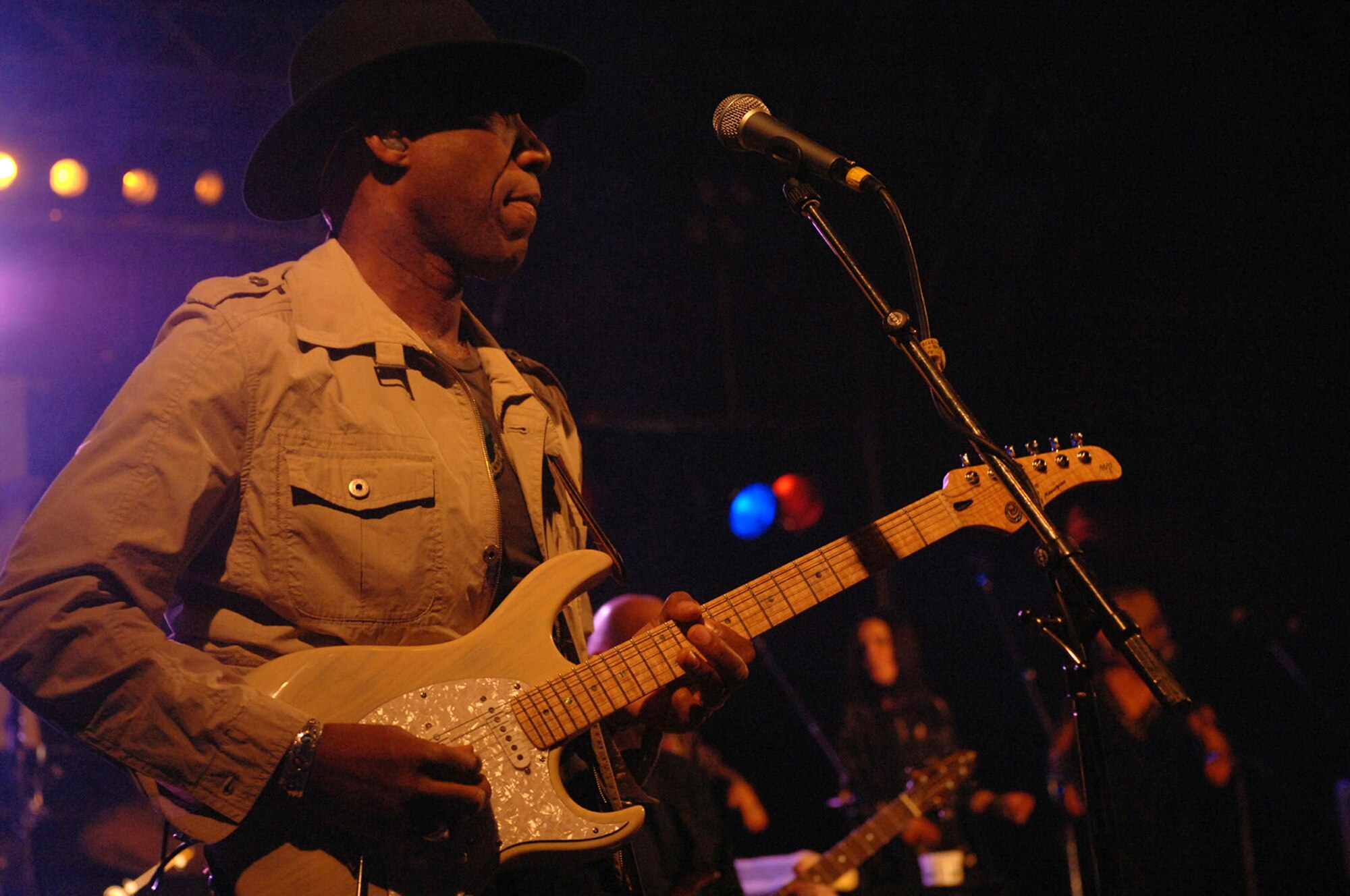 Kimo Williams, Lt. Dan Band electric guitarist and vocals, performs May 15 at Spangdahlem Air Base, Germany. The band is just wrapping up its 2007 European tour. They played five United Service Organization, or USO, shows throughout Belgium and Germany. (U.S. Air Force photo/Airman 1st Class Stephanie Moore)