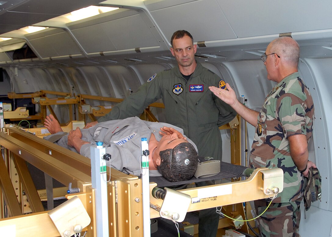 Maj. David Bradfield, medical readiness flight commander, shows Maj. Gen. Mark Zamzow, Air Education and Training Command air, space and information operations director, watches the medical readiness site during the general's visit May 14. (U.S. Air Force photo/Mike Litteken)