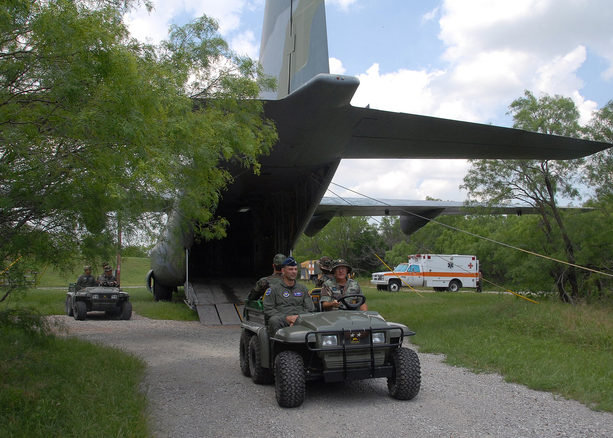 Maj. Gen. Mark Zamzow, Air Education and Training Command air, space and information operations director, watches visits the medical readiness training site during the general's visit May 14. (U.S. Air Force photo/Mike Litteken)