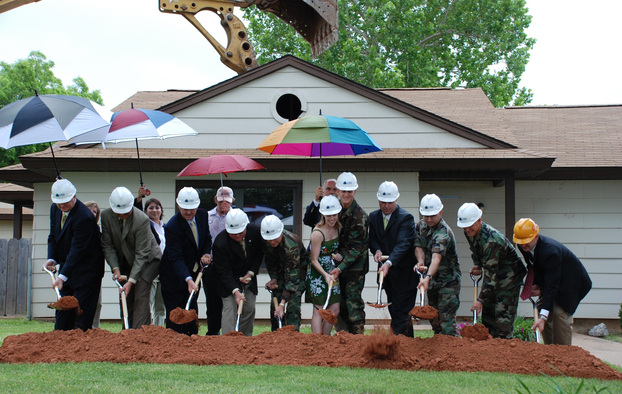 Officials break ground at the site of new officer and senior enlisted homes May 15. (U.S. Air Force photo/Airman 1st Class Jacob Corbin)