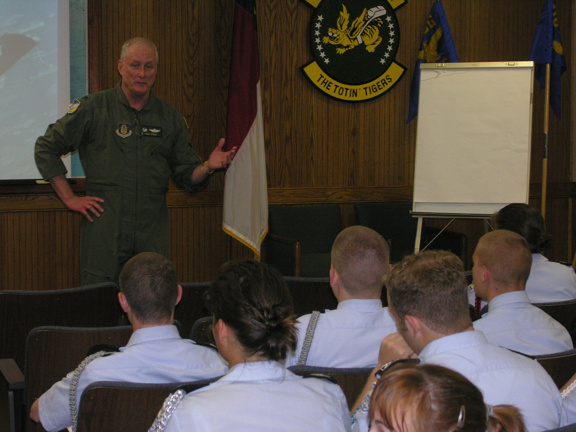 As one of the few flying wings on the east coast to still support regular Junior ROTC and ROTC flights, the 916th Air Refueling Wing, Air Force Reserve ended their annual orientation flight program for the summer in May. Each year the KC-135R air-to-air refueling wing educates nearly 200 cadets about the mission of the Air Force Reserve. Pictured here, Col. Paul Sykes, wing commander, talks to the students about the wing's mission prior to the highlight of their visit, an actual in-air refueling. (U.S. Air Force Photo/Senior Airman Brandon Rizzo)
