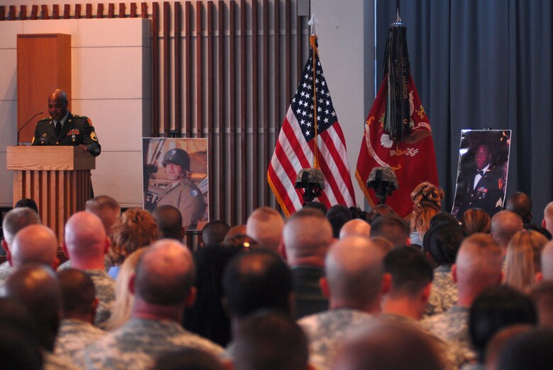 Staff Sgt. Malow Rooks speaks at a memorial service for Staff Sgt. Kenneth Thomas and Sgt. Richard Smith, all members of 1-1 Air Defense Artillery Battalion, May 17. Staff Sgt. Thomas and Sgt. Smith were killed in a car accident May 12 on Okinawa, Japan.
(U.S. Air Force/Airman 1st Class Kasey Zickmund)