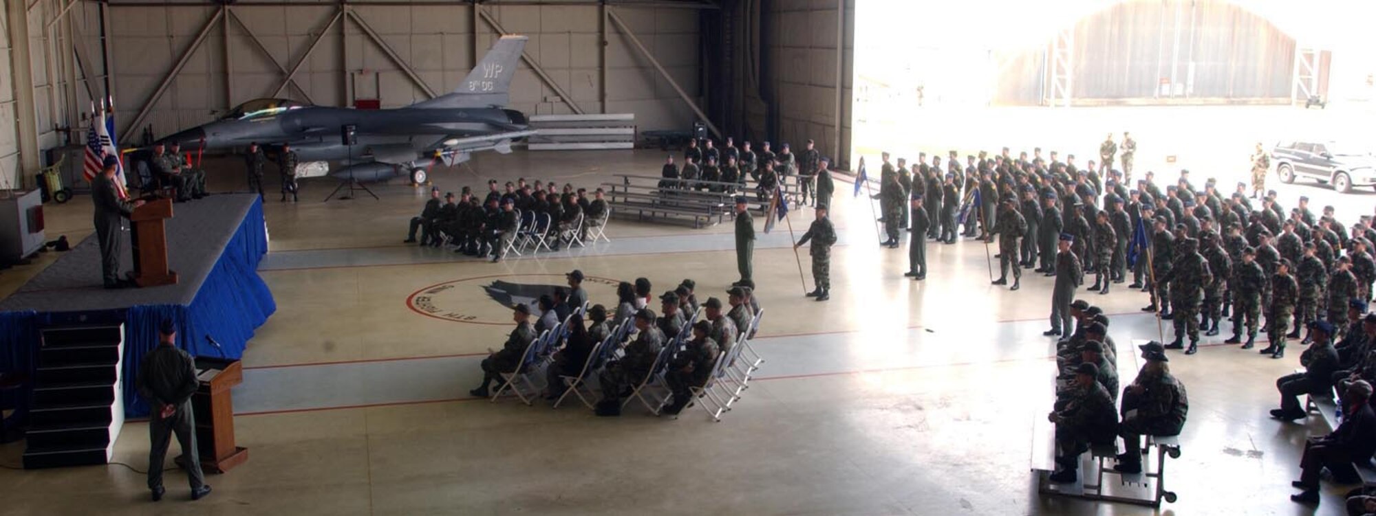 Airmen stand in formation during the 8th Operations Group change of command ceremony here May 18. Col. Kenneth Rizer assumed command from Col. Jon Norman, who will be taking command of the 51st Fighter Wing at Osan Air Base, Republic of Korea. 