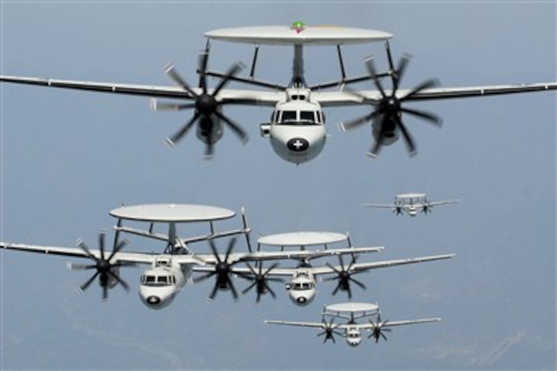 Five U.S. Navy E-2C Hawkeyes fly in formation near Mount Fuji in Japan on May 9, 2007.  The Hawkeyes are assigned to Carrier Airborne Early Warning Squadron 115 which is one of nine squadrons assigned to the Naval Air Facility Atsugi, Japan-based Carrier Air Wing Five assigned to the USS Kitty Hawk (CV 63).  The Kitty Hawk operates out of Fleet Activities Yokosuka, Japan.  