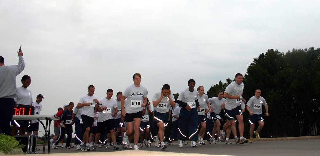 Runners take off at the sound of a gunshot for the Bunker Hill Run May 19.  The five-kilometer run was one of several weekend activities sponsored in celebration of Armed Forces Day. Other activities included another marathon run, a Warrior Day for the 782nd Training Group, and a 25-mile bike ride. (U.S. Air Force photo/Staff Sgt. Tonnette Thompson)