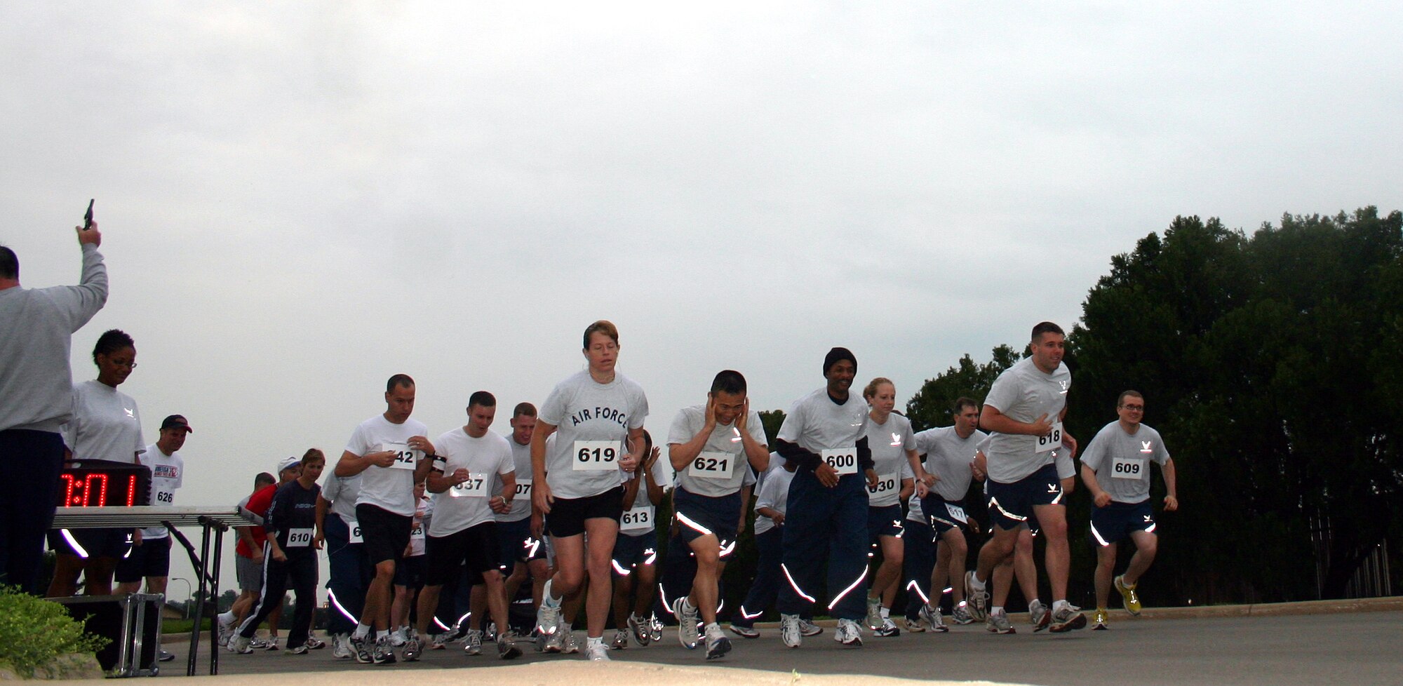 Runners take off at the sound of a gunshot for the Bunker Hill Run May 19.  The five-kilometer run was one of several weekend activities sponsored in celebration of Armed Forces Day. Other activities included another marathon run, a Warrior Day for the 782nd Training Group, and a 25-mile bike ride. (U.S. Air Force photo/Staff Sgt. Tonnette Thompson)