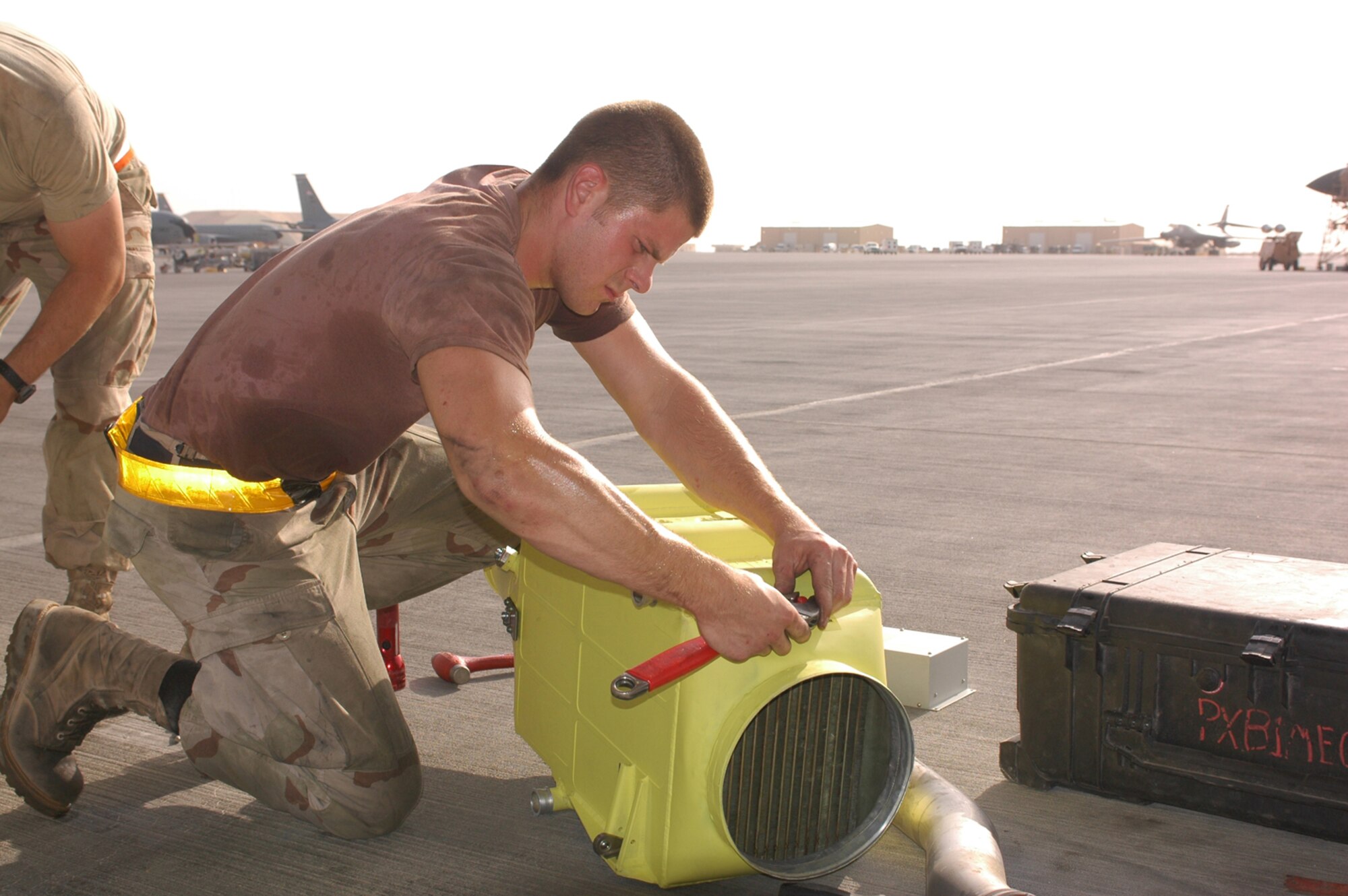 Airman 1st Class David Wonsitler, 34th Aircraft Maintenance Unit electro-environment maintainer, preps a heat exchanger for installation. The heat exhanger cools the coolant oil in the avionics bay to keep all electronic parts from overheating. (U.S. Air Force photo by Senior Airman Erik Hofmeyer)