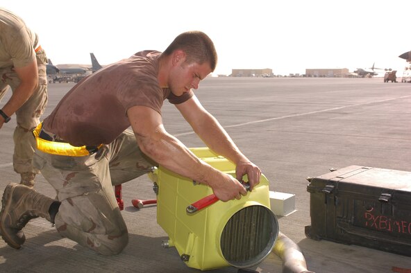 Airman 1st Class David Wonsitler, 34th Aircraft Maintenance Unit electro-environment maintainer, preps a heat exchanger for installation. The heat exhanger cools the coolant oil in the avionics bay to keep all electronic parts from overheating. (U.S. Air Force photo by Senior Airman Erik Hofmeyer)