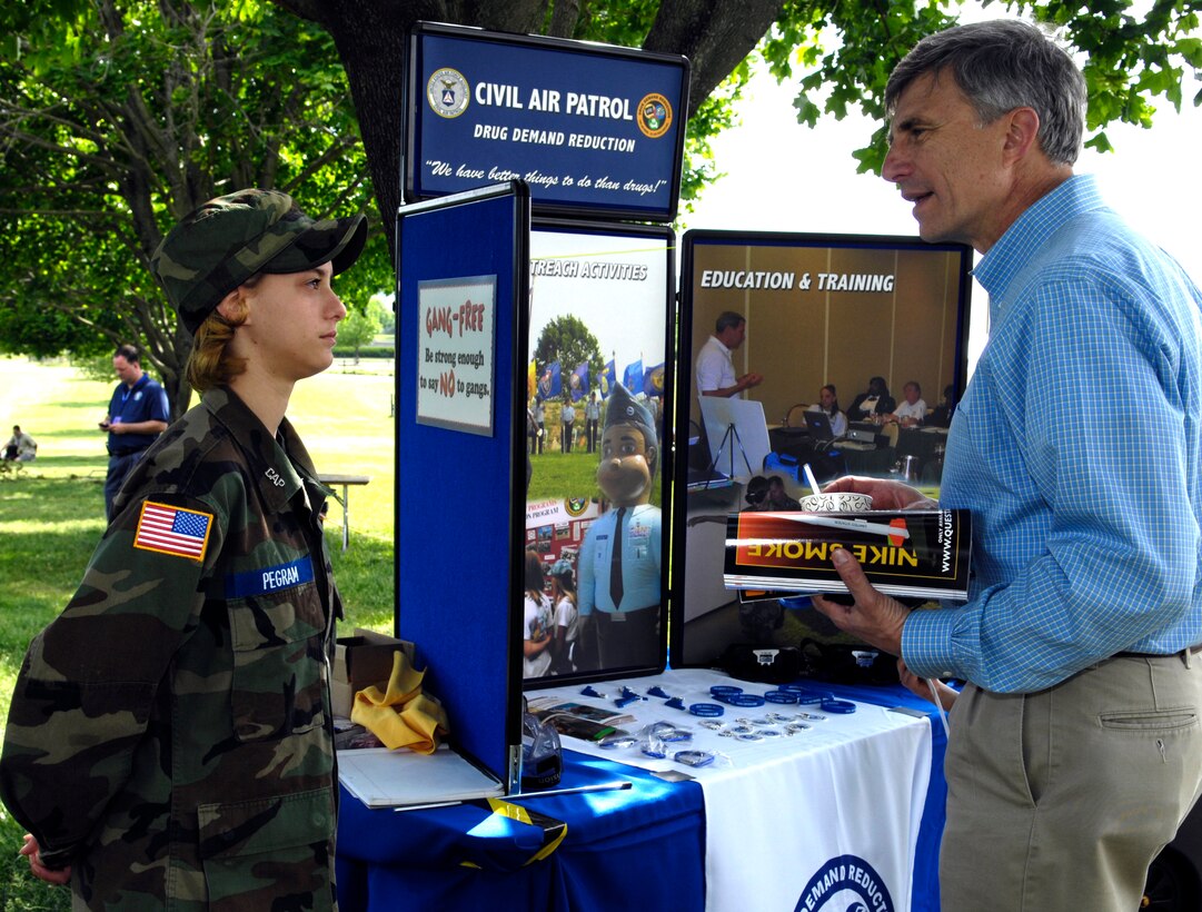 Dr. Ronald M. Sega, Under Secretary of the Air Force speaks with Virginia Civil Air Patrol cadet Airman Basic Rachel Pegram during the Team America Rocketry Challenge in Plains, Va., May 19, 2007.  Designated the Department of Defense Executive Agent for Space, Dr. Sega develops, coordinates and integrates plans and programs for space systems and the acquisition.