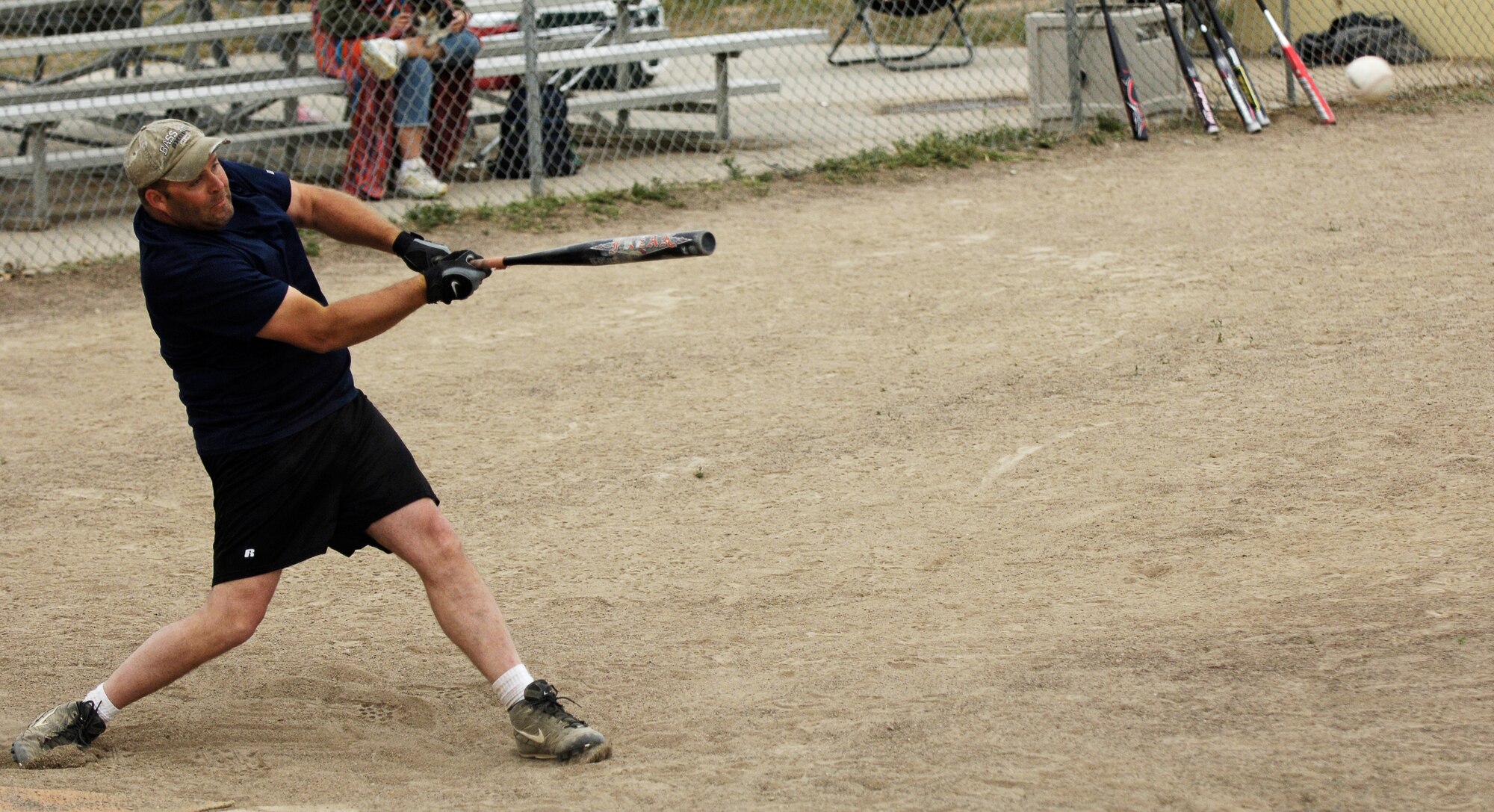 MOUNTAIN HOME AIR FORCE BASE, Idaho -- James Budine, 366th Fighter Wing, cracks the ball into play during the second annual Spring Fling softball tournament May 19 and 20. Hosted by the 366th CS Booster Club, five teams participated in the weekend's events with the 366th Fighter Wing coming out on top with a flawless 7-0 record. U.S. Air Force photo/Airman 1st Class Ryan Crane