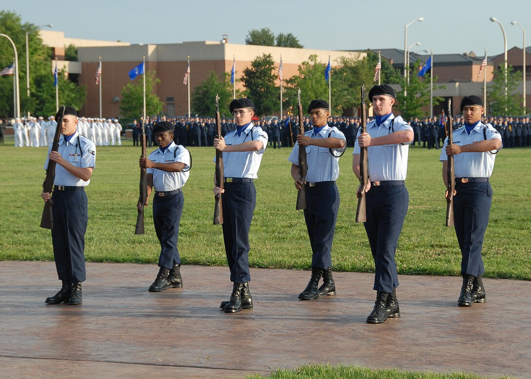 An Airmen-in-Training rifle team performs for distinguished visitors May 18 during the annual Armed Forces Day Parade.  (U.S. Air Force photo/Mike Litteken)