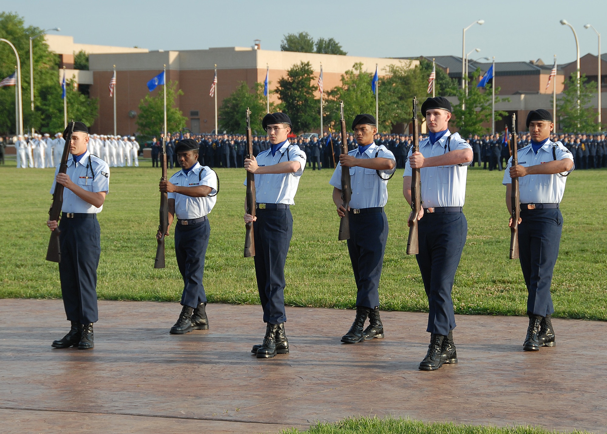 An Airmen-in-Training rifle team performs for distinguished visitors May 18 during the annual Armed Forces Day Parade.  (U.S. Air Force photo/Mike Litteken)