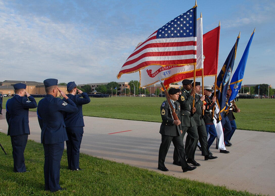 Reviewing officials salute the colors May 18 at Sheppard during the annual Armed Forces Day Parade at the base parade grounds. Airmen, Soldiers and Sailors turned out to honor each of the military services. (U.S. Air Force photo/Mike Litteken)